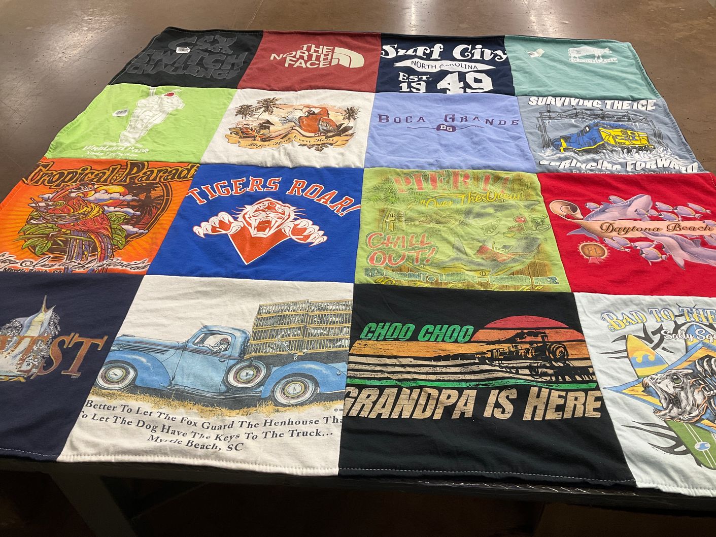 T-shirt quilt with beach, fishing themes by Christine from VA