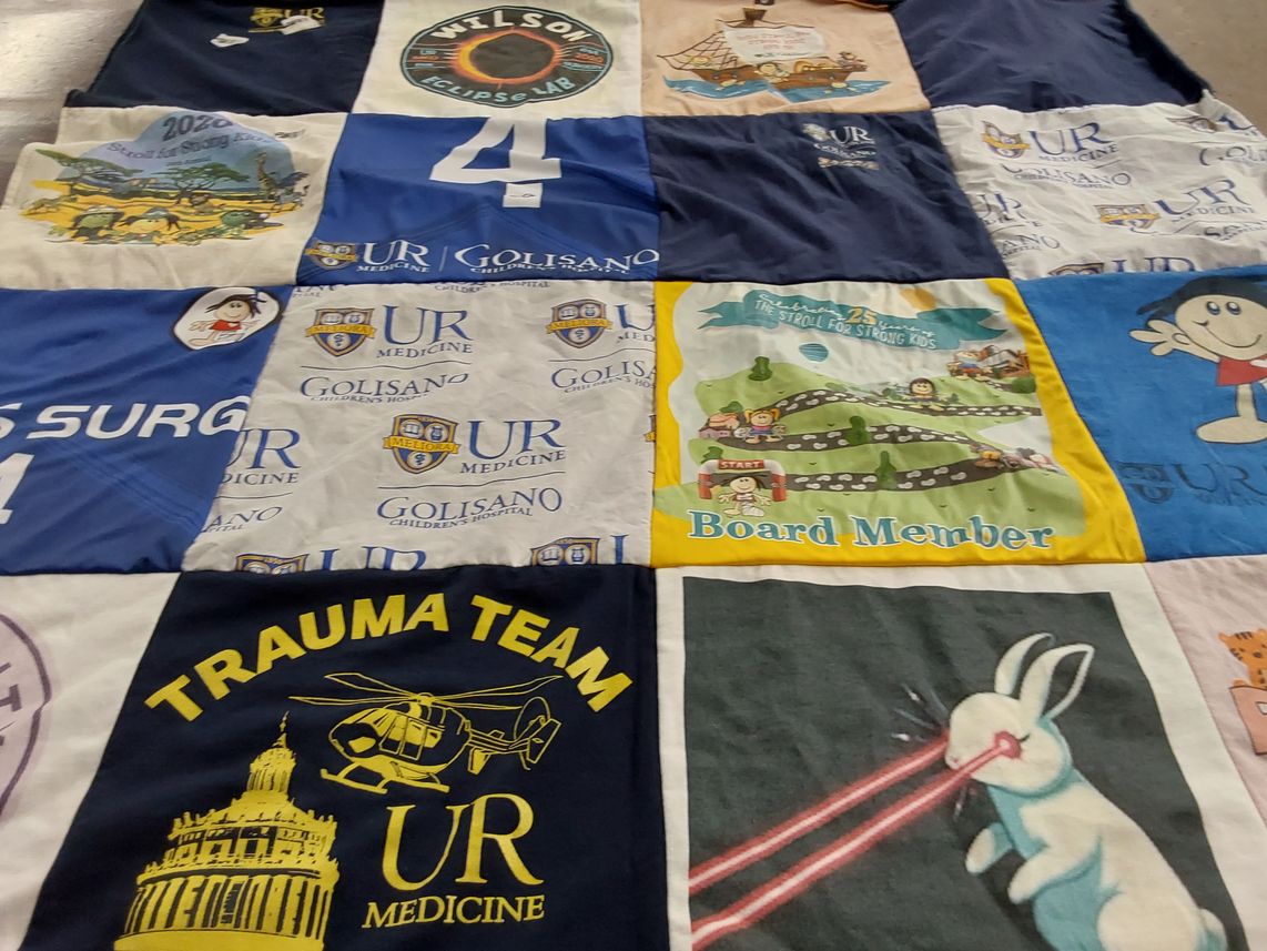 T-shirt quilt with children's health, community service themes by Marjorie from NY