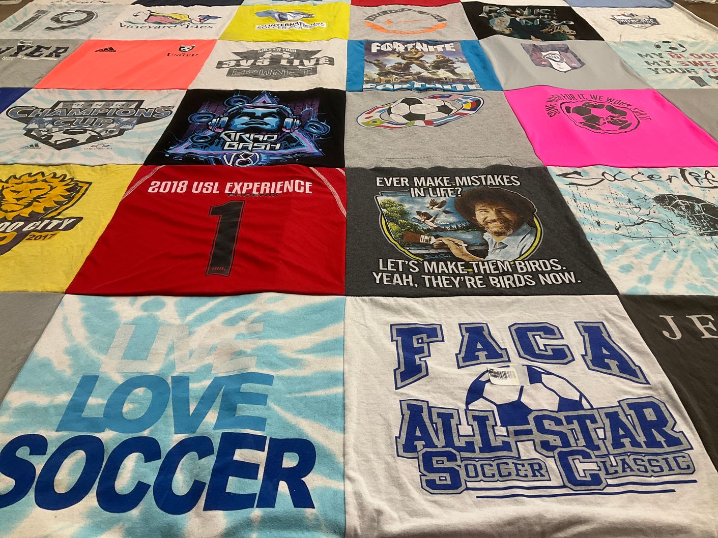 T-shirt quilt with soccer, gaming themes by Ivy from FL
