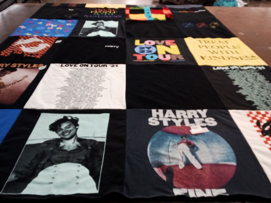 T-shirt quilt with music, pop culture themes by Shea from CA