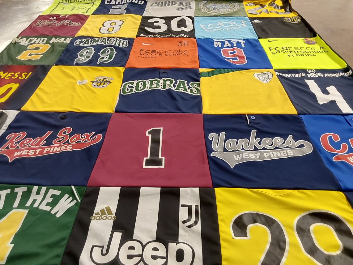 T-shirt quilt with soccer, baseball themes by Nichole from FL