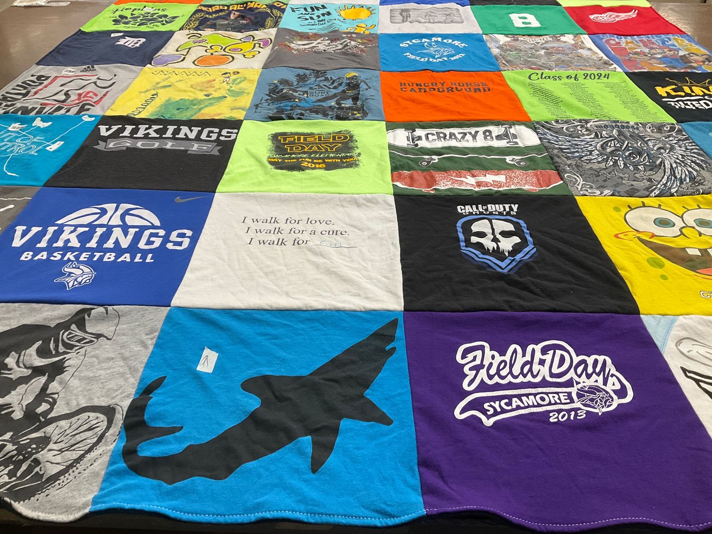 T-shirt quilt featuring vikings basketball team by June from MI