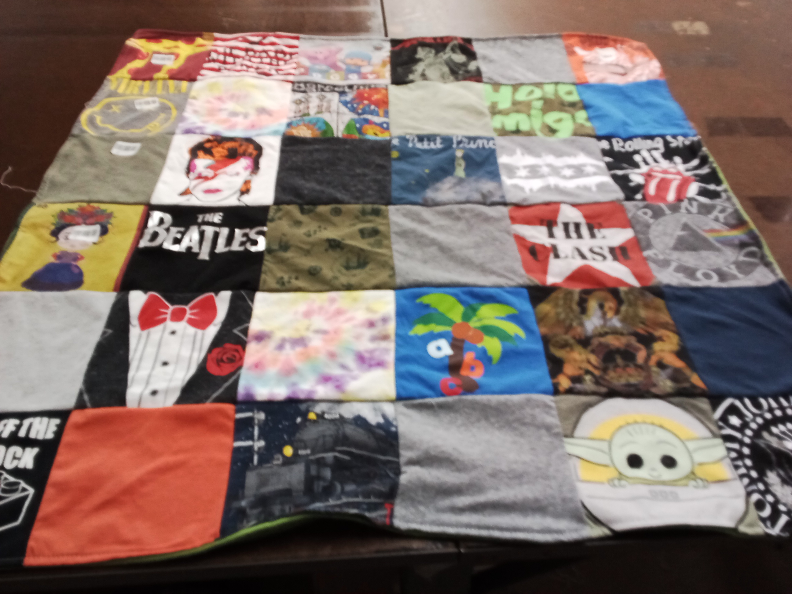 T-shirt quilt with music, art themes by Melissa from IL