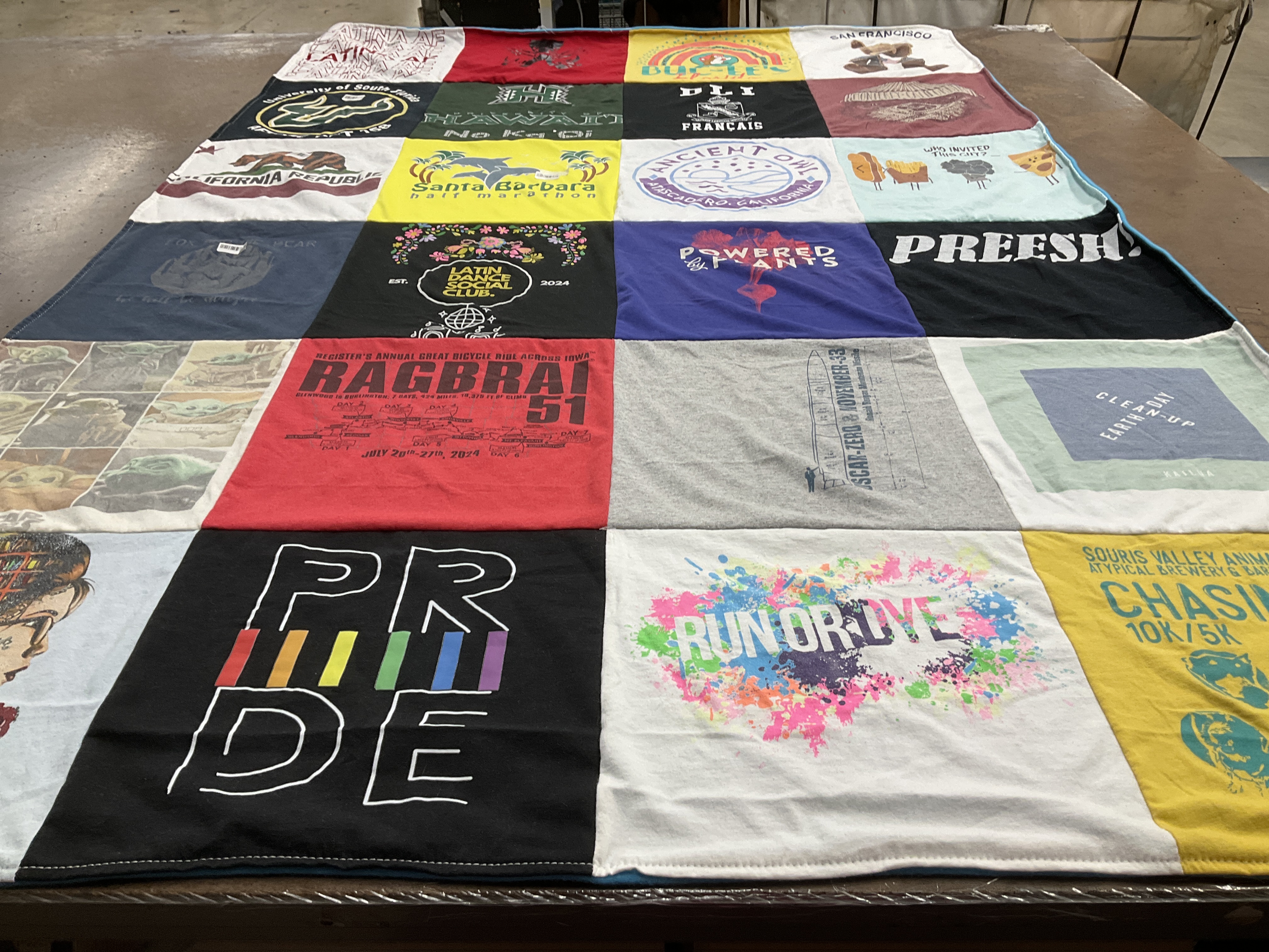 T-shirt quilt with cycling, running themes by Nia from CA