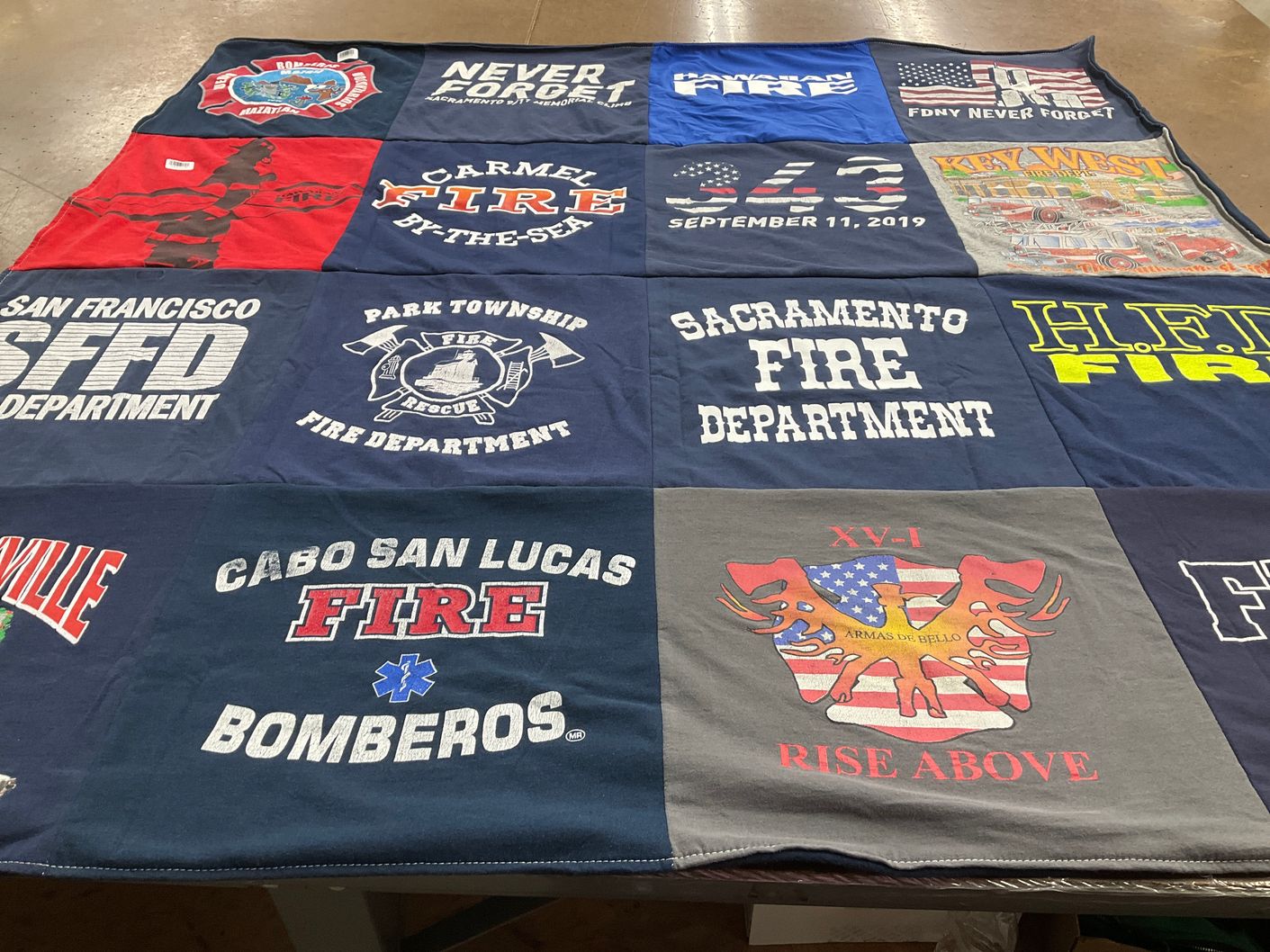 T-shirt quilt with firefighting, emergency response themes by James from CA