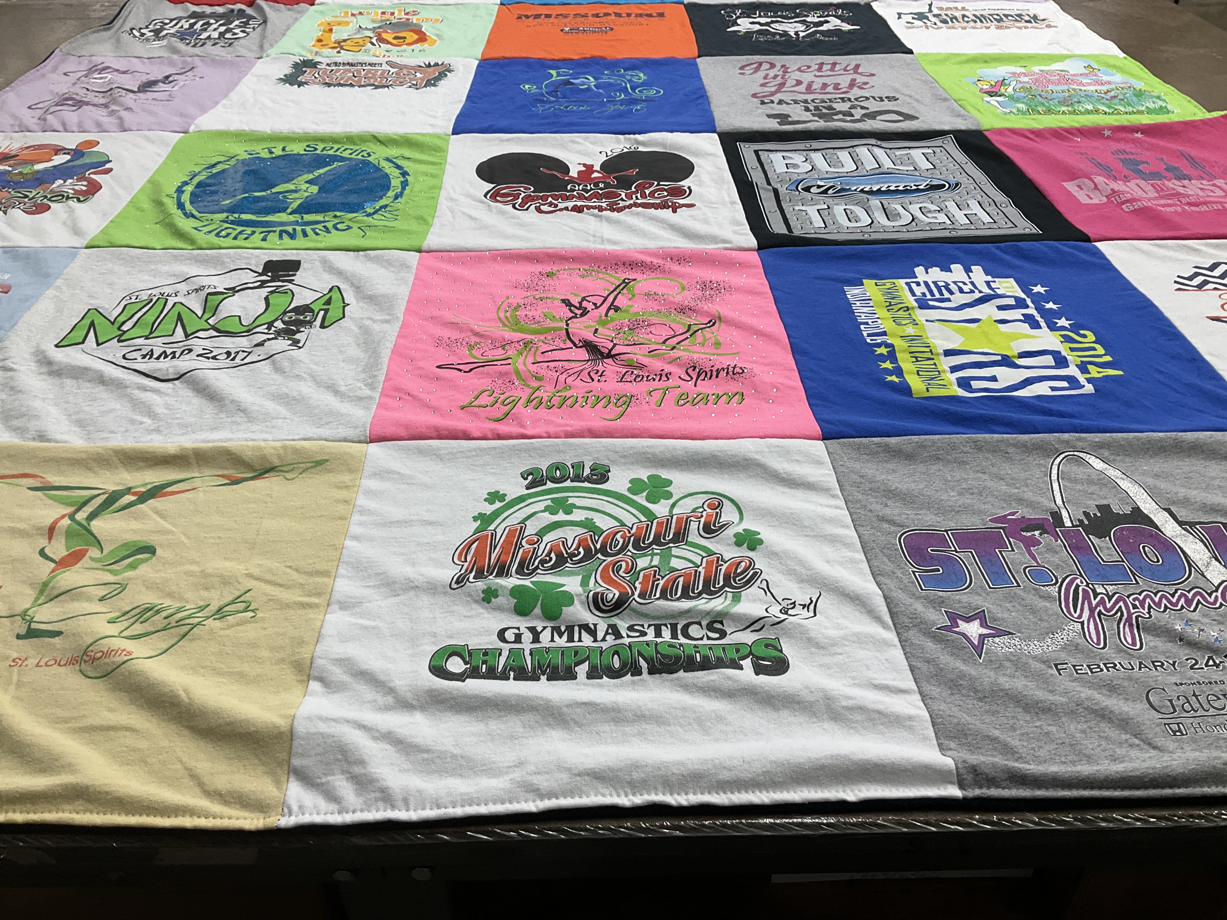 T-shirt quilt with gymnastics, sports themes by Julie from MO