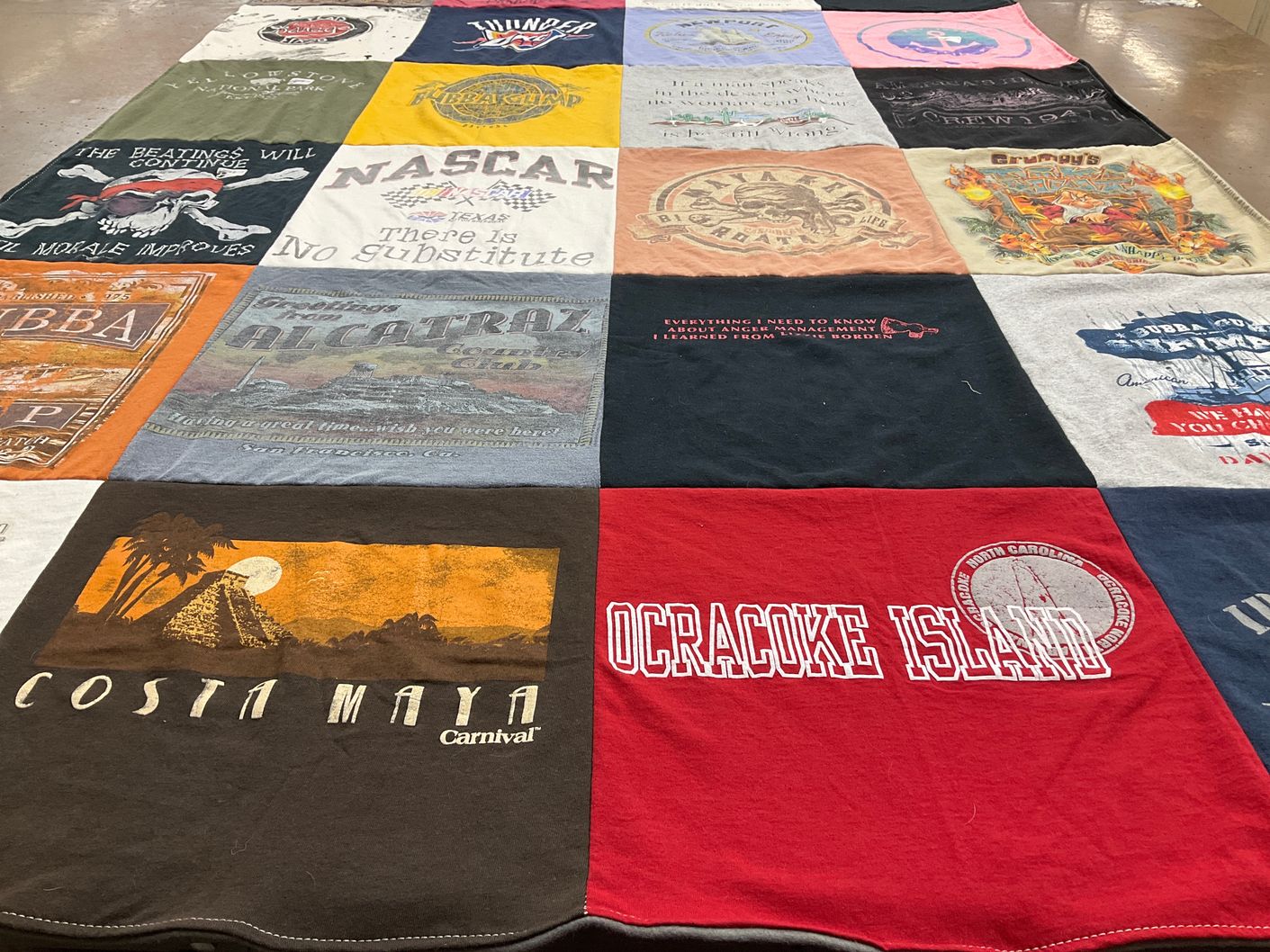 T-shirt quilt with travel, motorsports themes by KIMI from OK