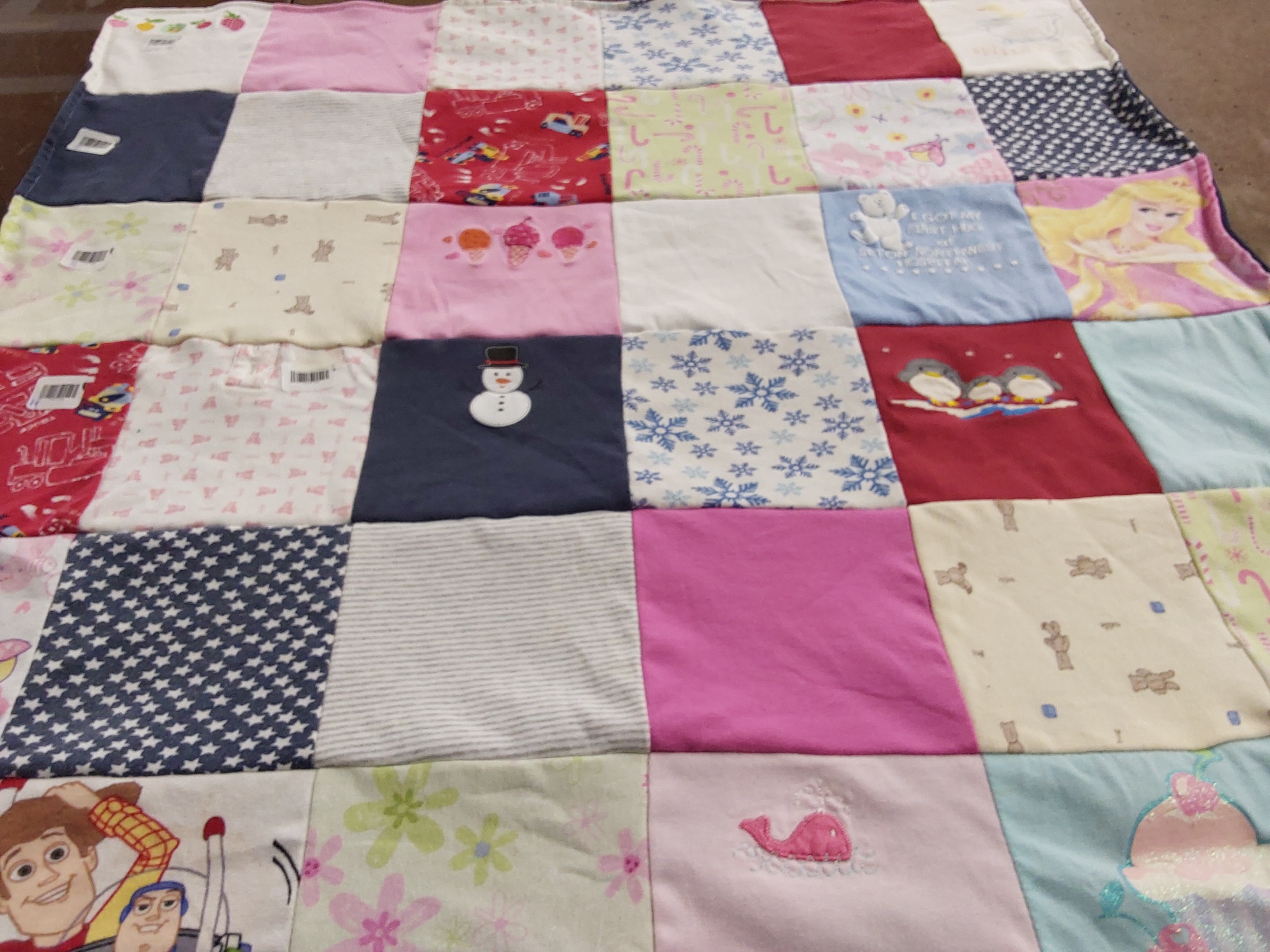 T-shirt quilt with children's characters, seasonal themes themes by Brian from TX