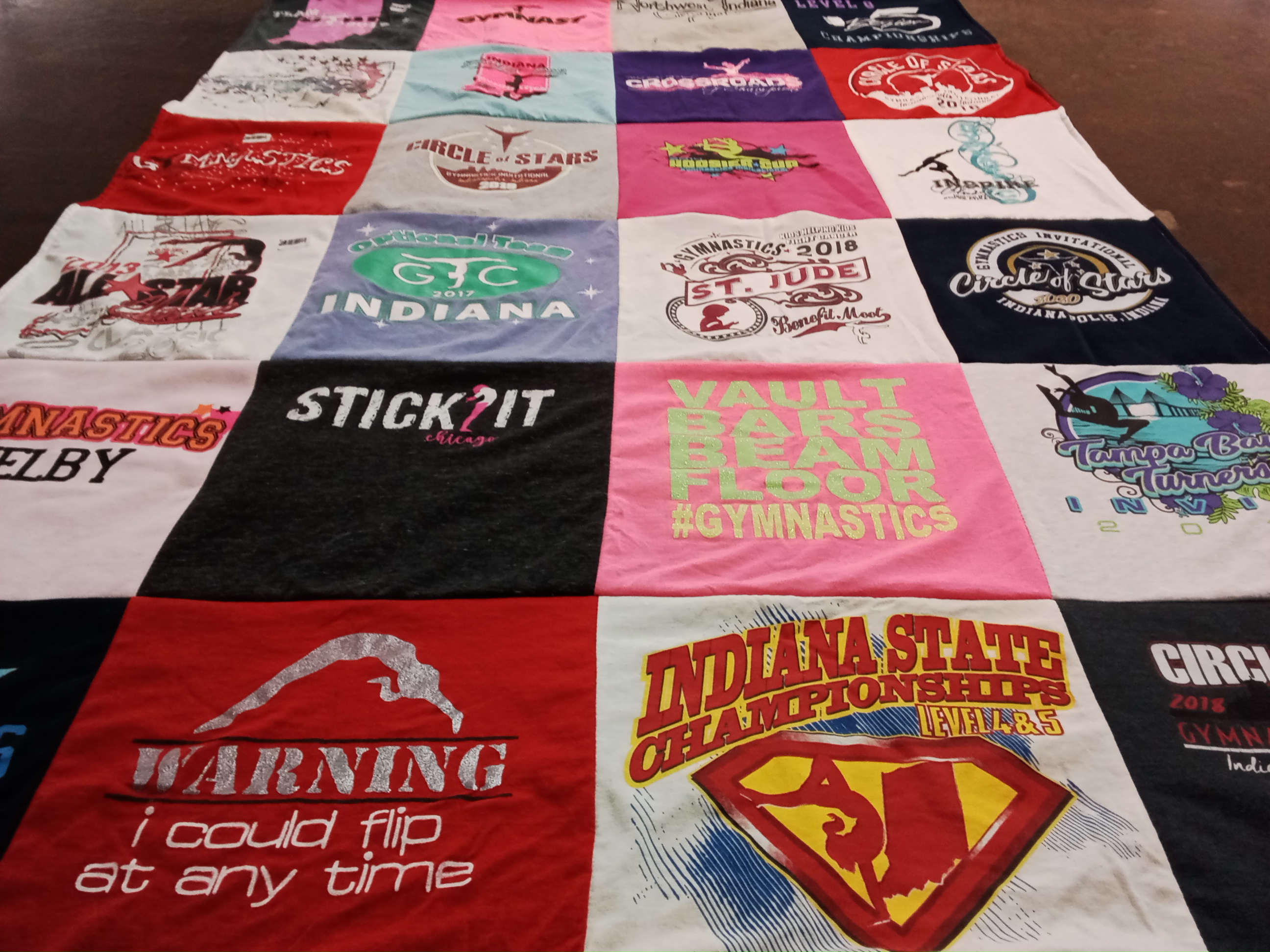 T-shirt quilt featuring circle of stars by Shelby from IN