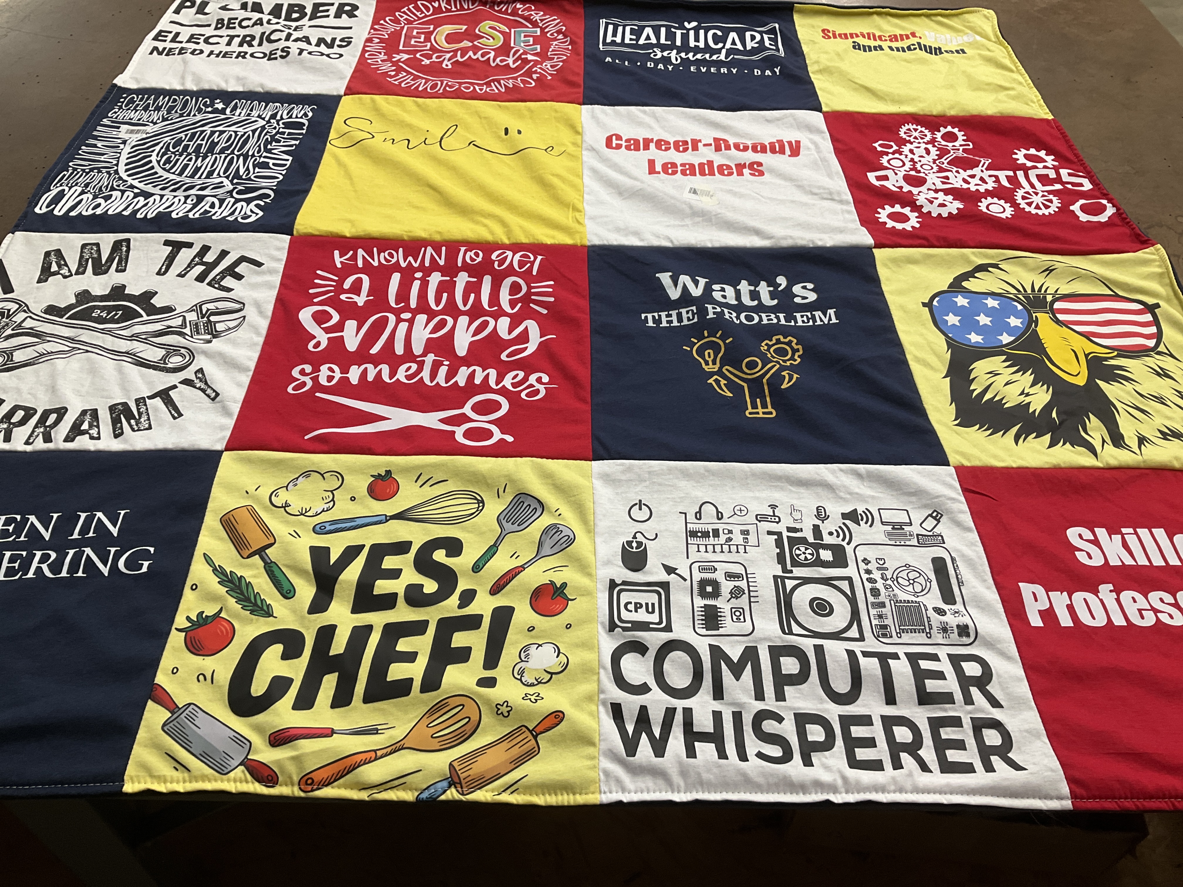 T-shirt quilt with cooking, technology themes by Donna from MA