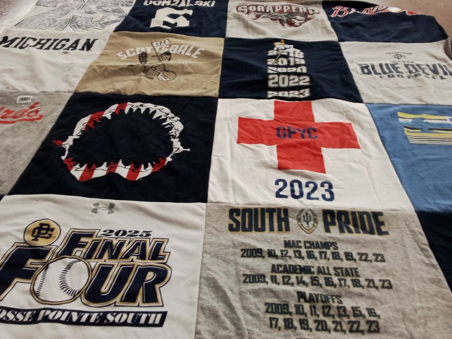 T-shirt quilt featuring lacrosse pointe south high school sports teams by Paige from MI