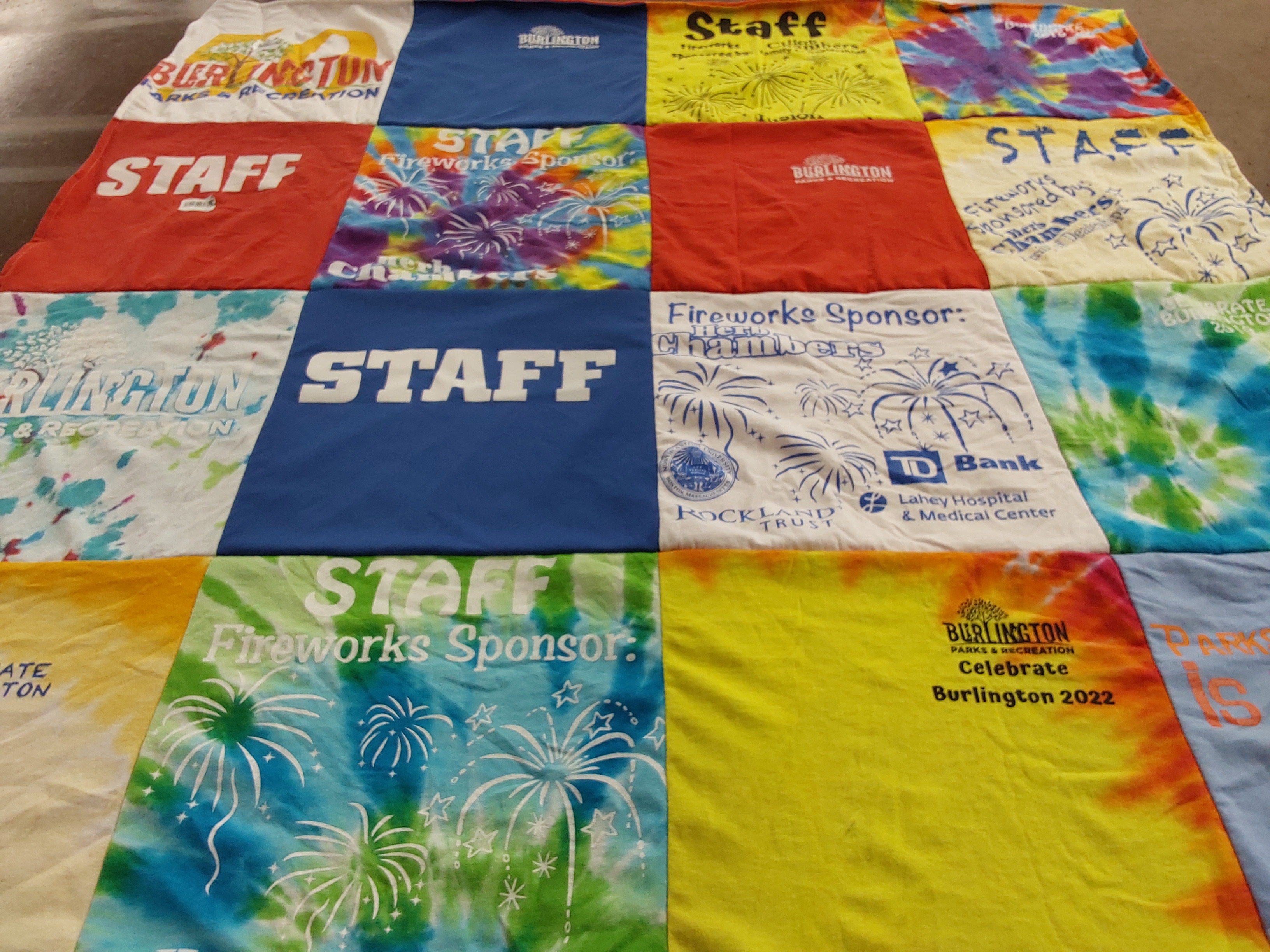 T-shirt quilt with community events, fireworks themes by Ryan from MA