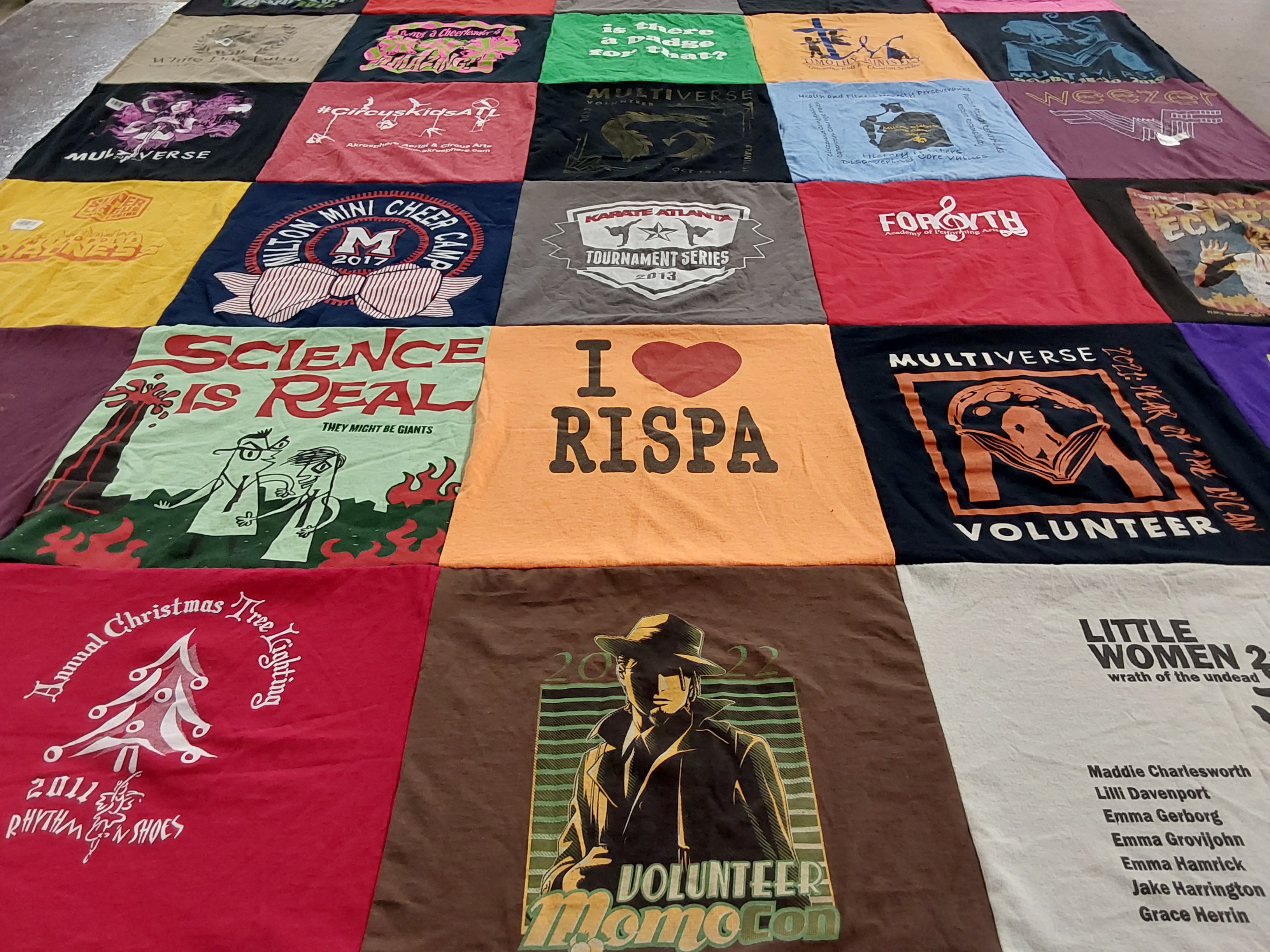 T-shirt quilt with science, volunteering themes by Allison from GA