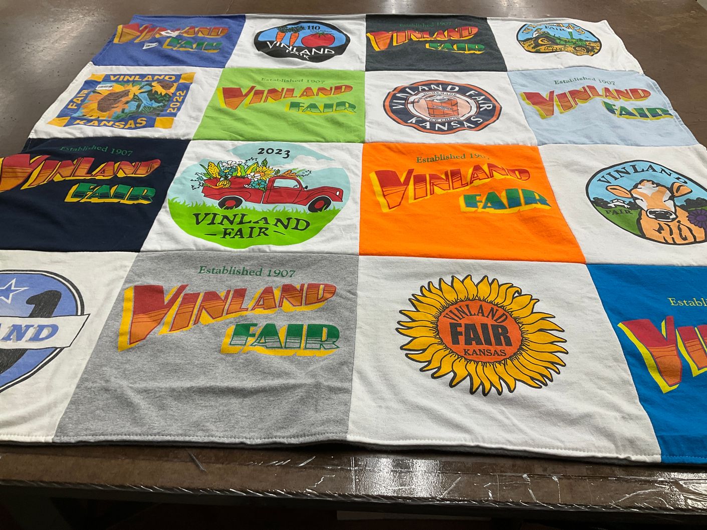 T-shirt quilt with fairs, community events themes by Brenna from KS