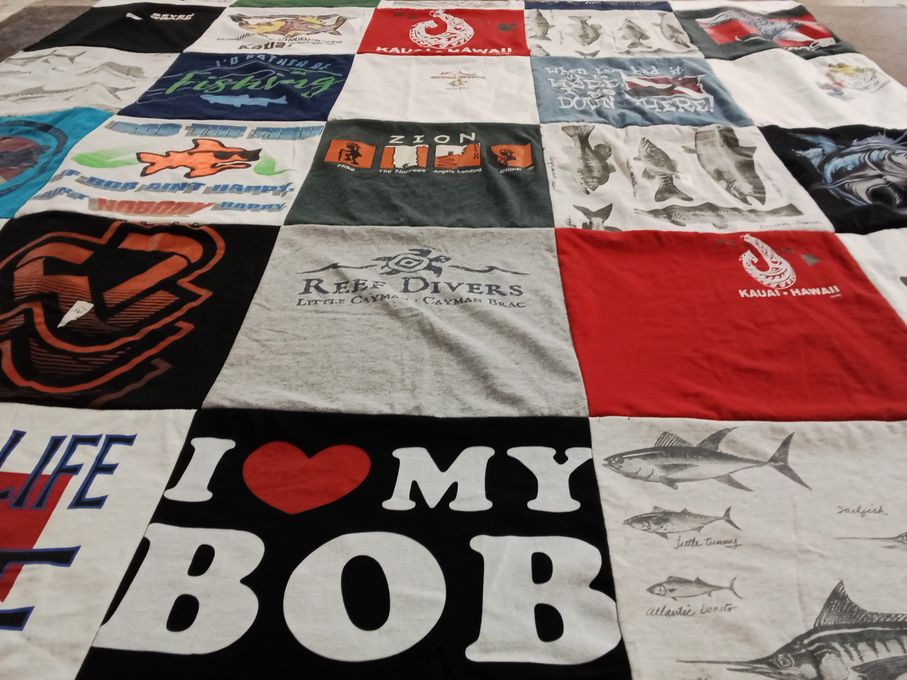 T-shirt quilt with fishing, marine life themes by Janice from PA