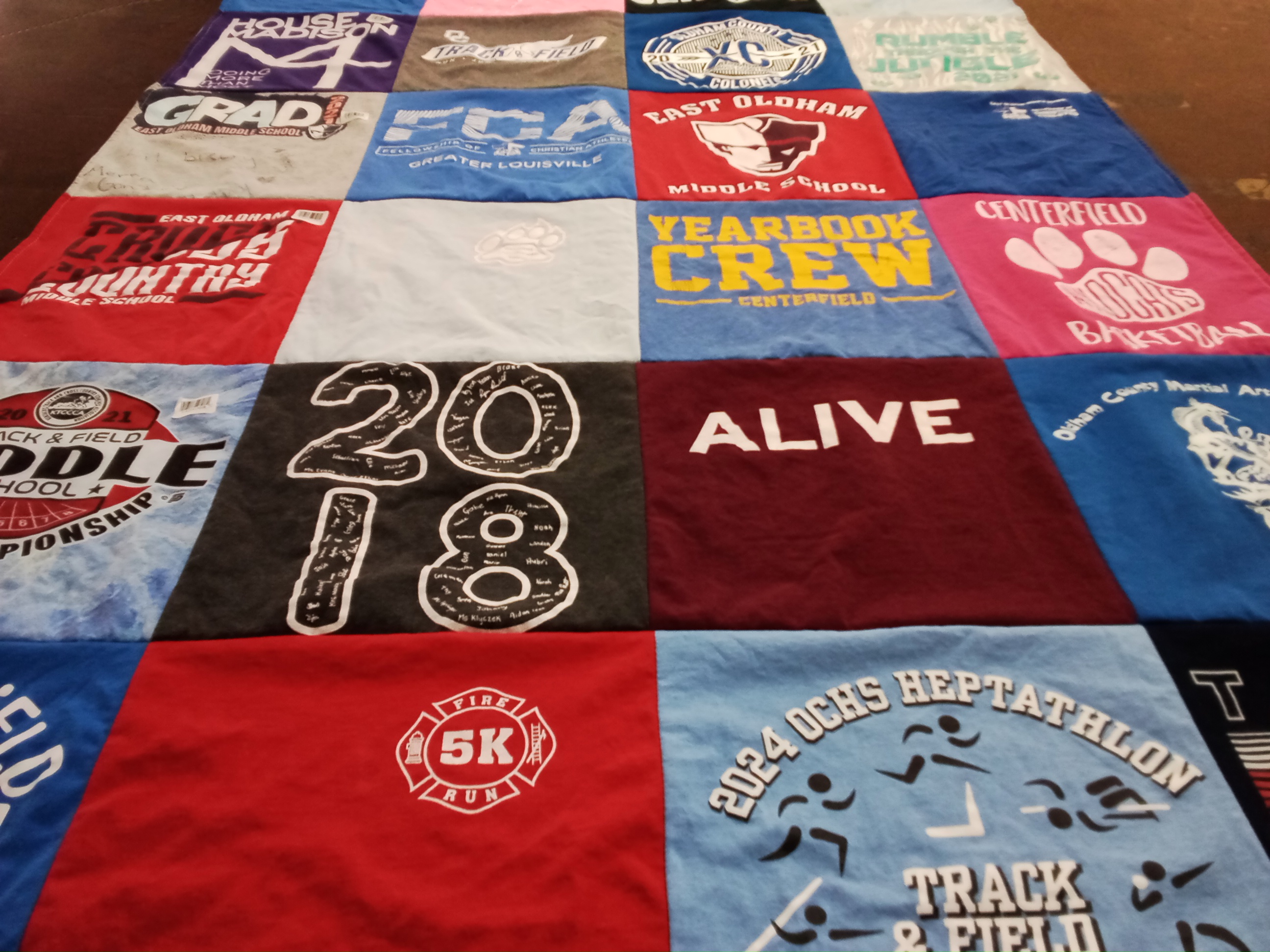 T-shirt quilt featuring track and field, cross country by Tamera from KY