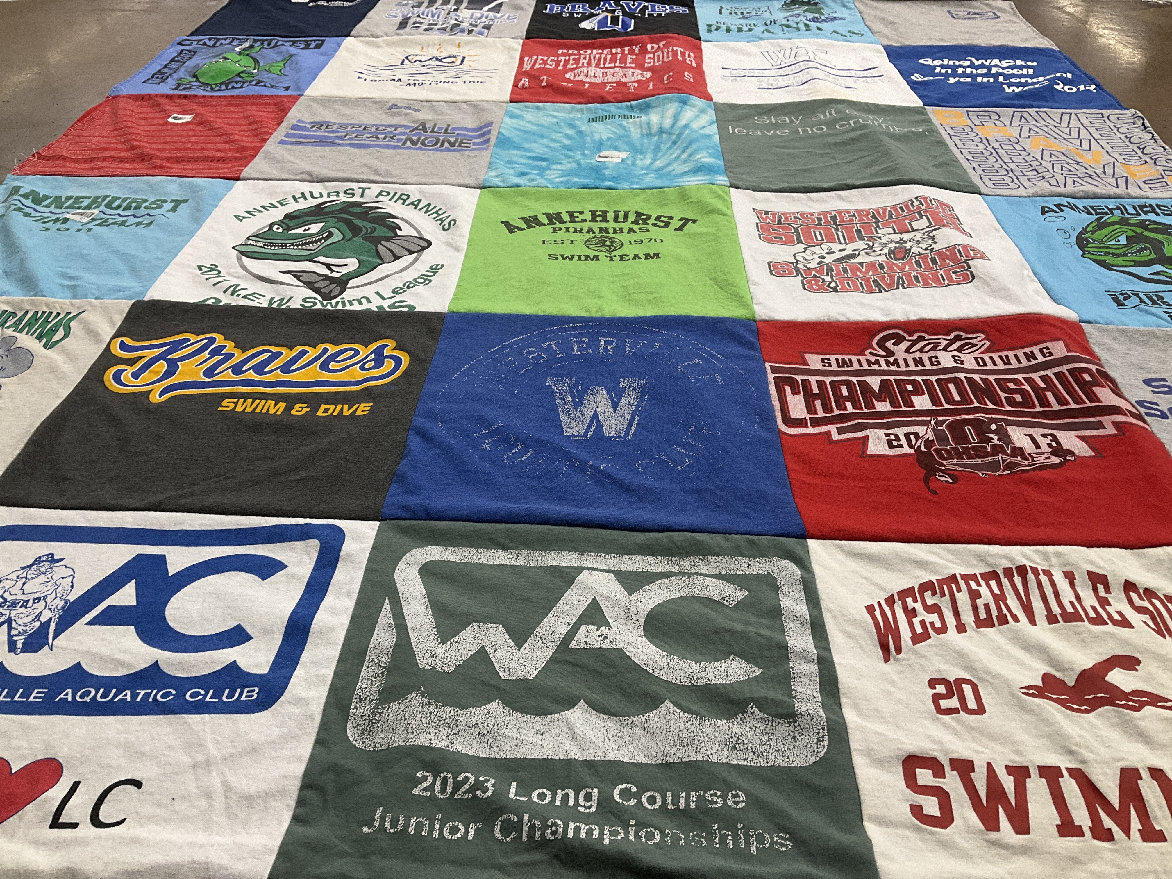 T-shirt quilt featuring westerville south swim team, annehurst piranhas swim team by Kathy from OH