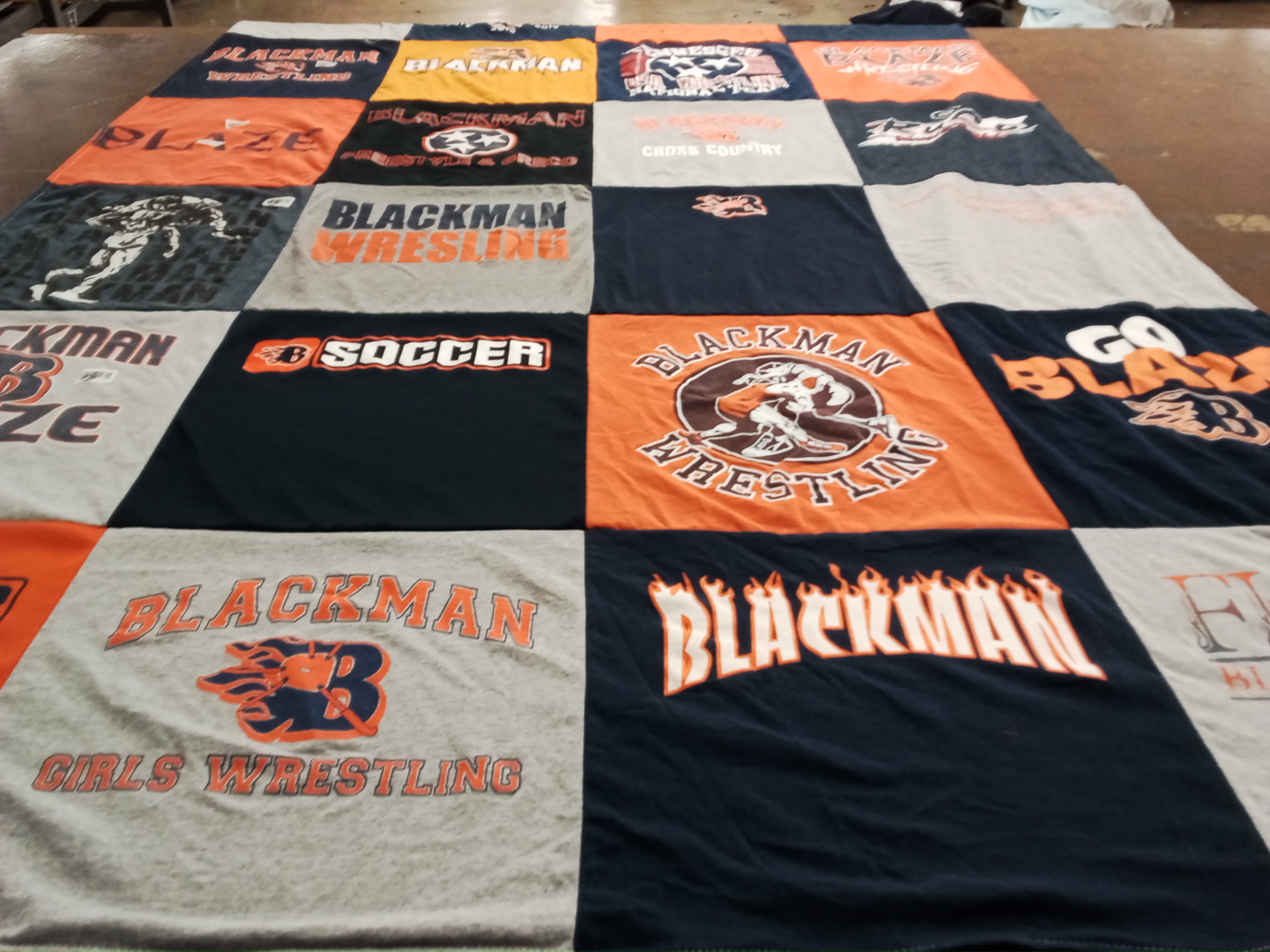 T-shirt quilt featuring blackman wrestling, blackman soccer by Mildred from TN