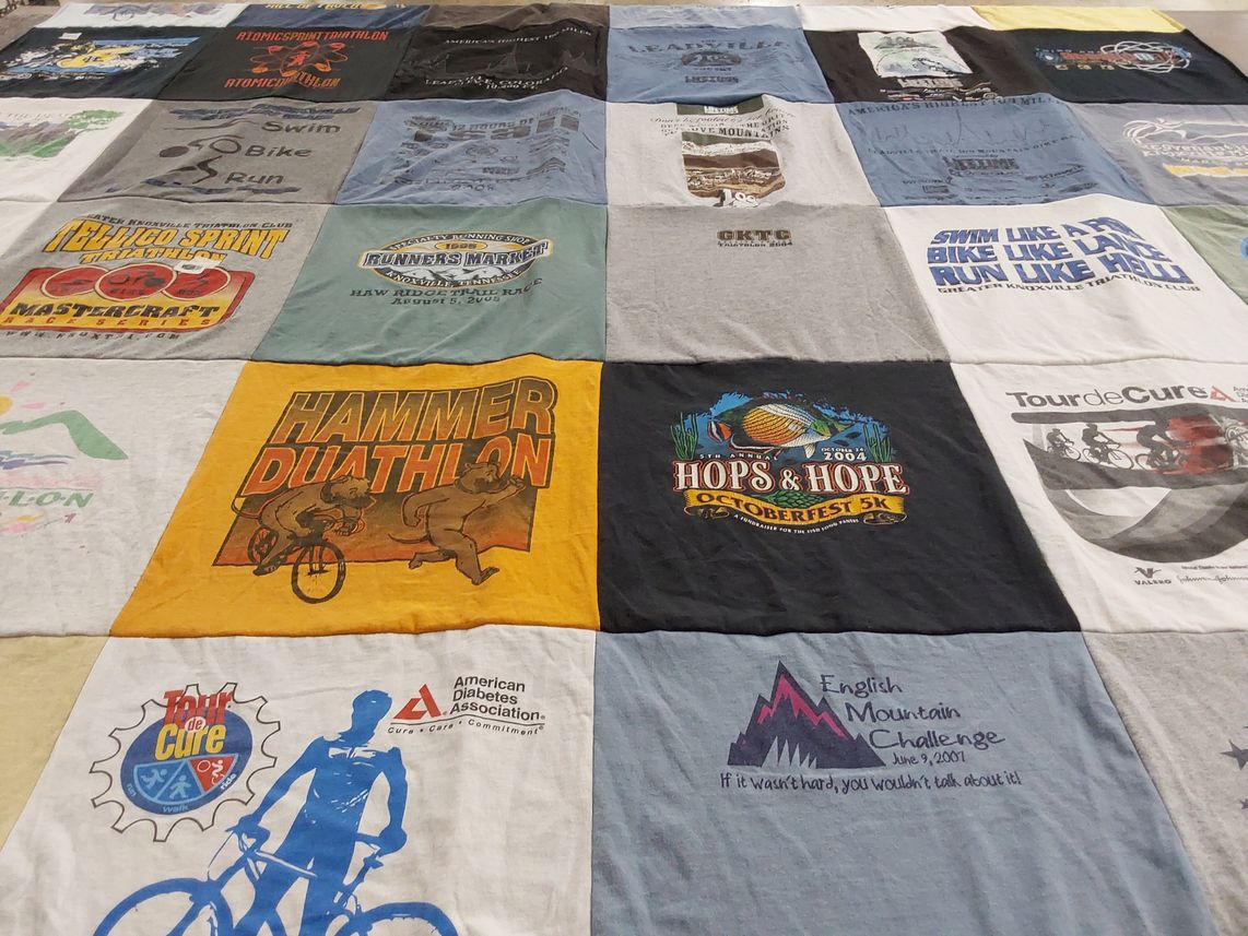 T-shirt quilt with triathlon, duathlon themes by Lee from TN