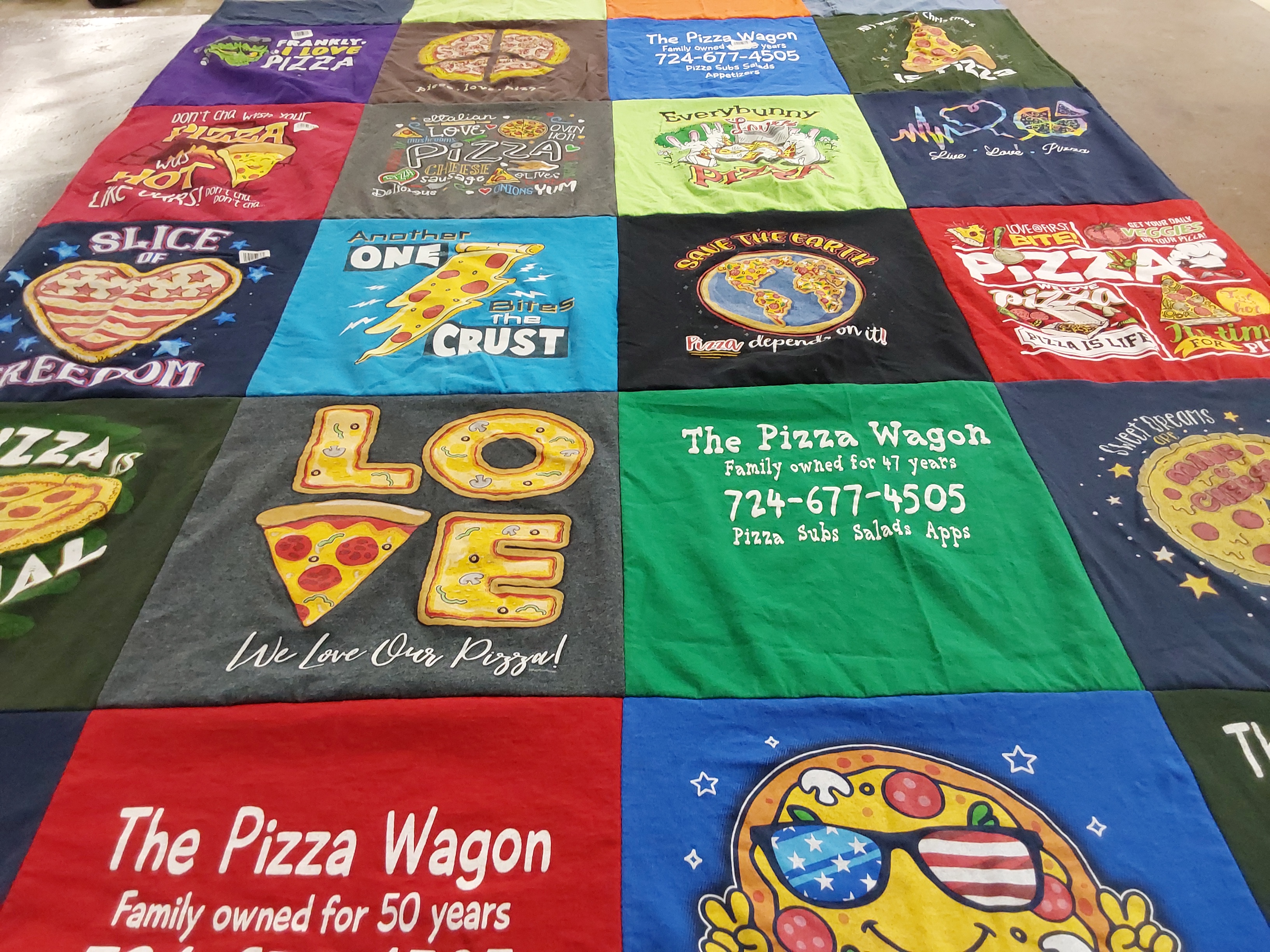 T-shirt quilt with pizza, cooking themes by Nancy from PA