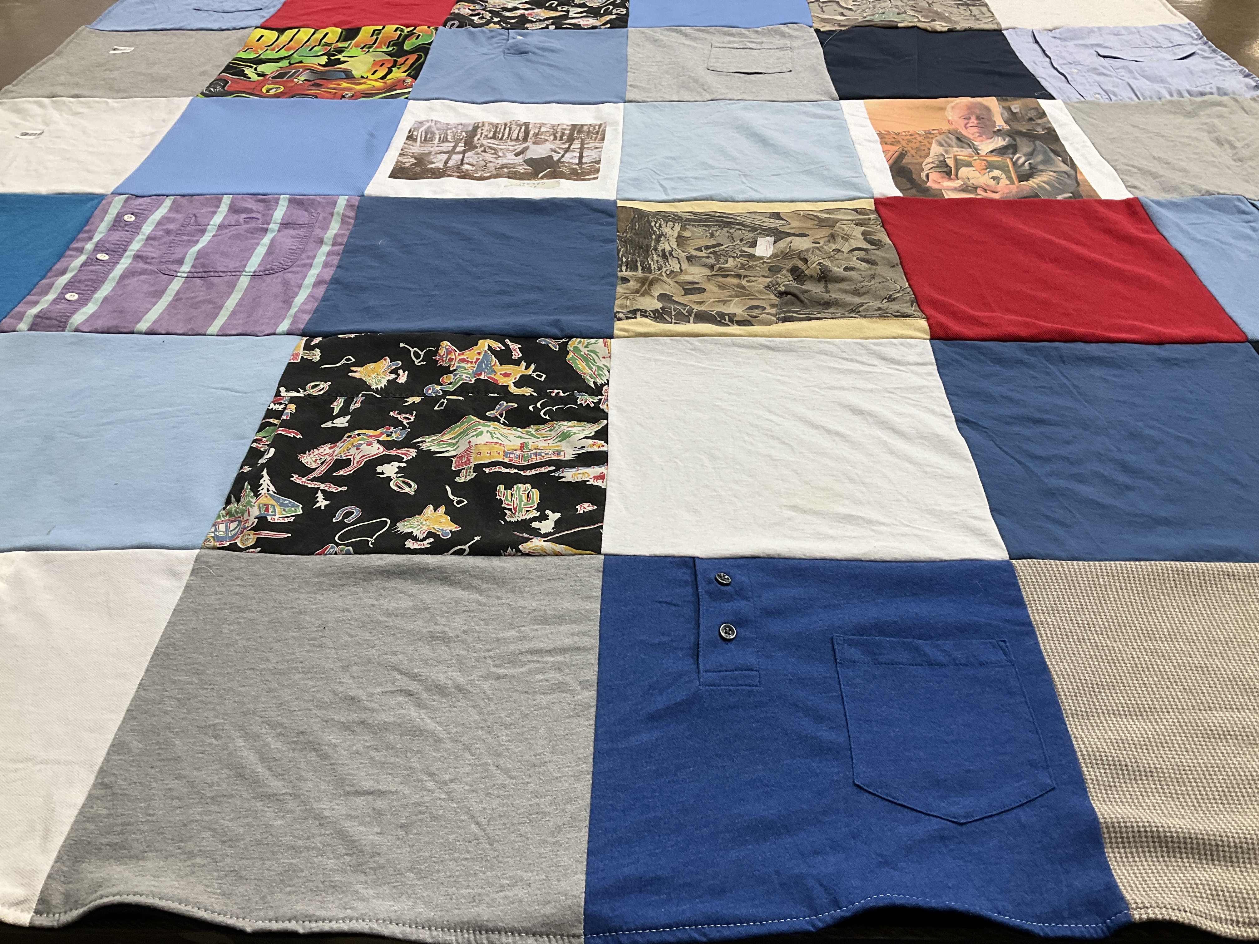 T-shirt quilt with nature, travel themes by Katie from MO