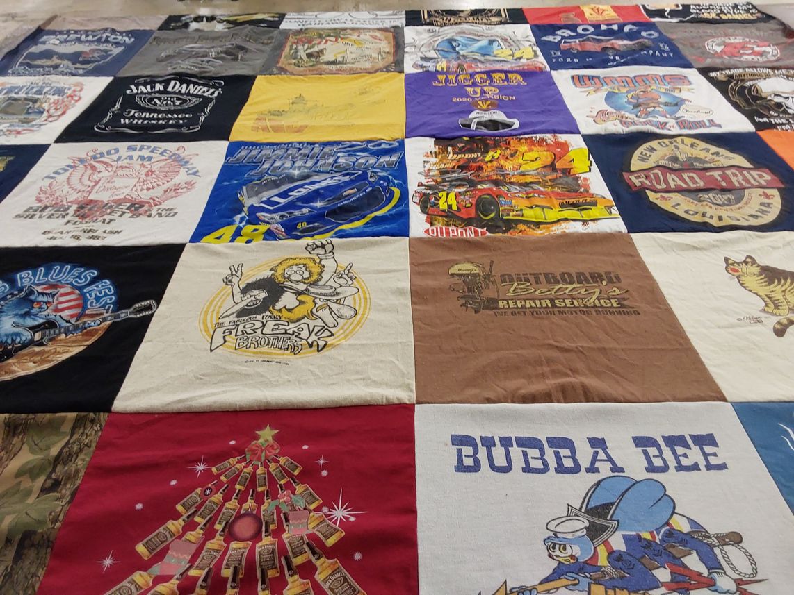 T-shirt quilt with motor racing, music themes by Betsy from OH