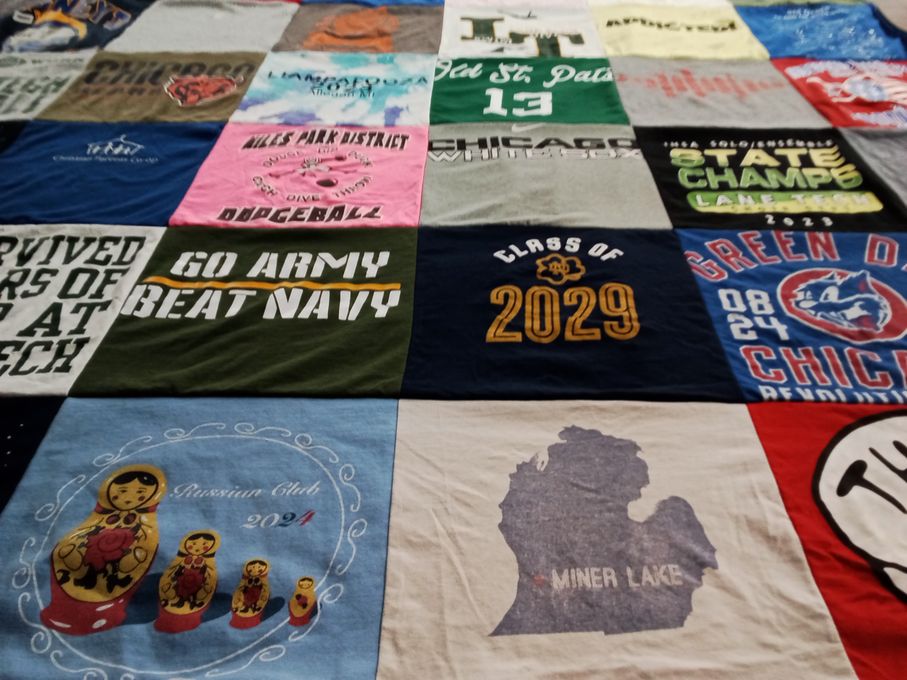 T-shirt quilt with sports, cultural themes by Tarin from IL