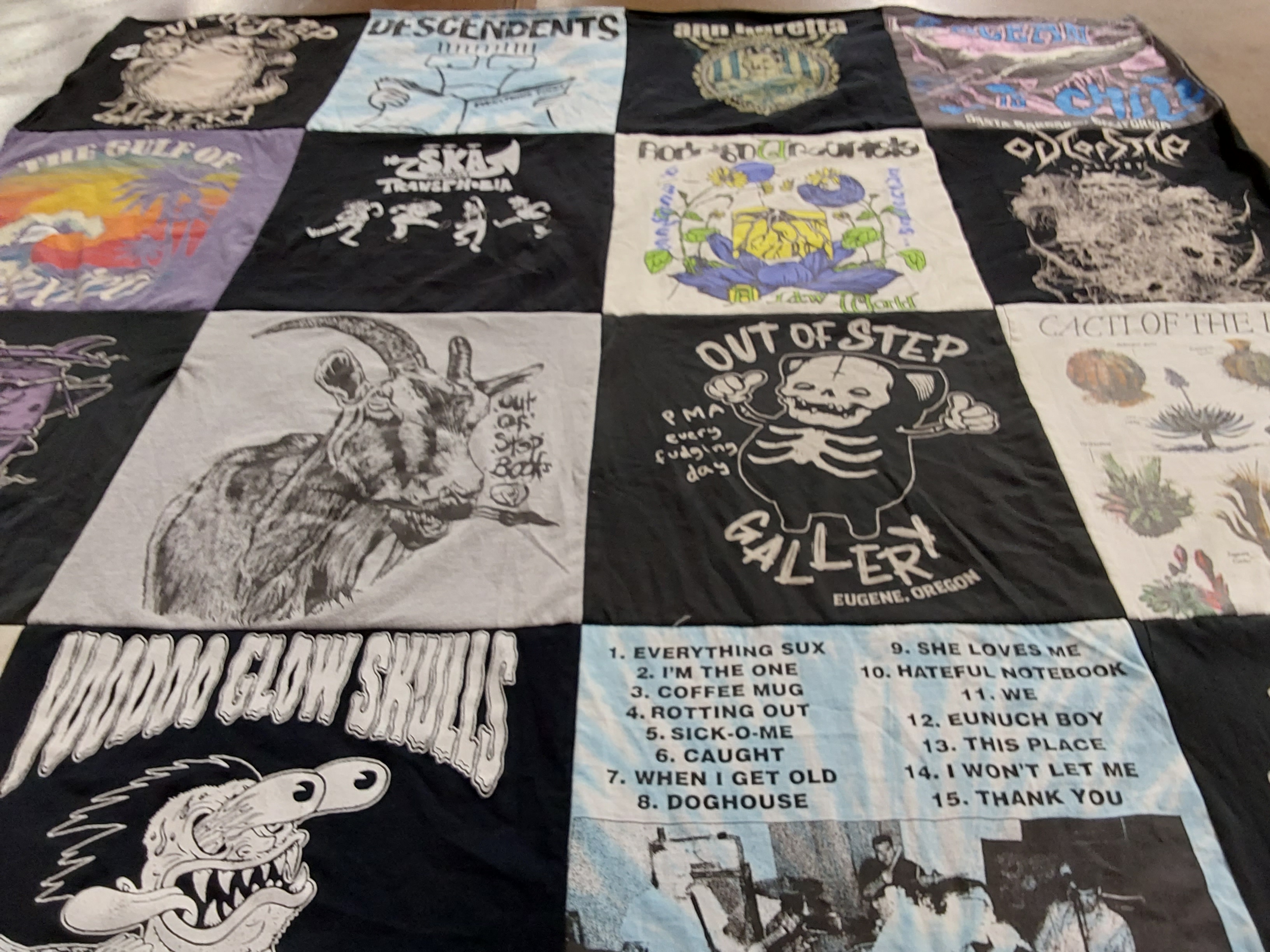 T-shirt quilt with punk, music themes by Jinxi from OR