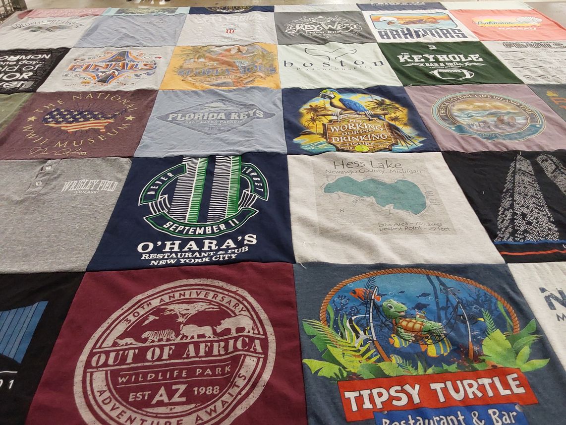 T-shirt quilt with travel, wildlife themes by Maureen from MI
