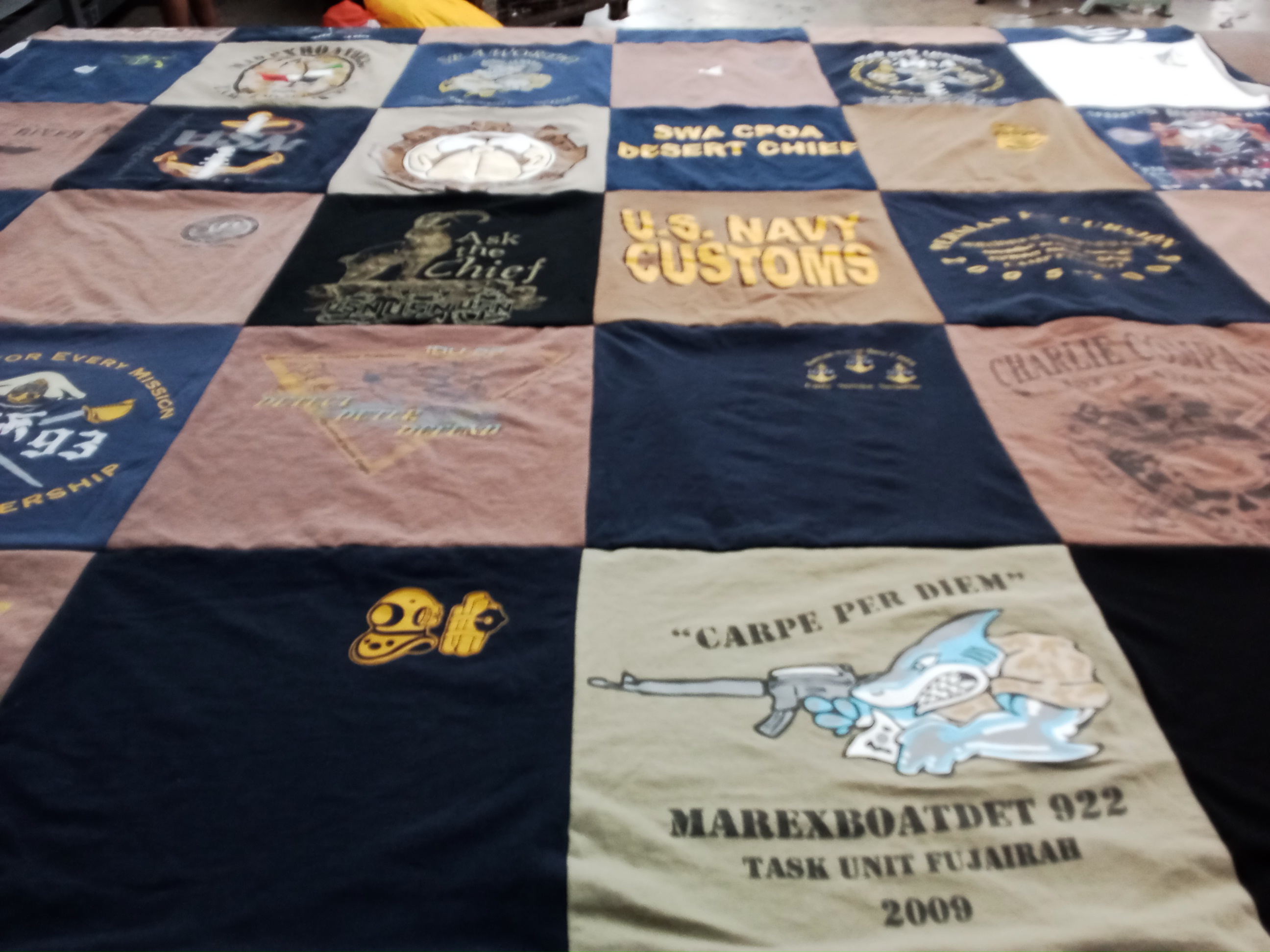 T-shirt quilt with military, navy themes by Mary from ME