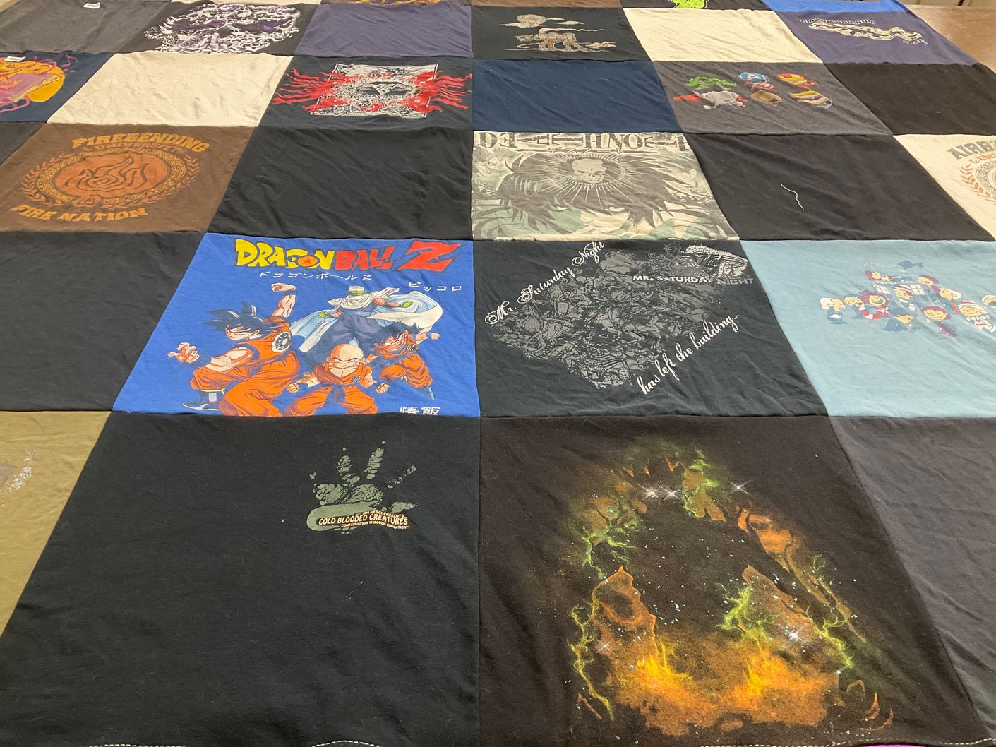 T-shirt quilt with anime, cartoons themes by Devan from WI