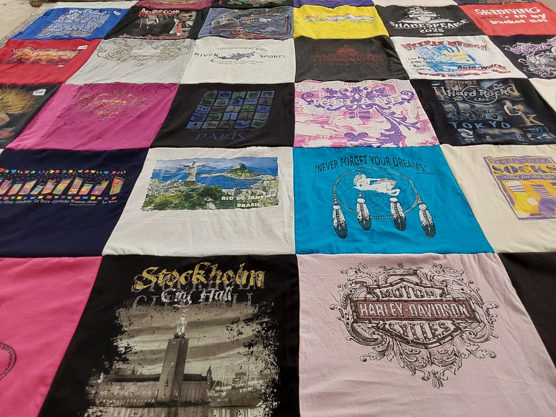 T-shirt quilt with travel, music themes by Carmen from PA