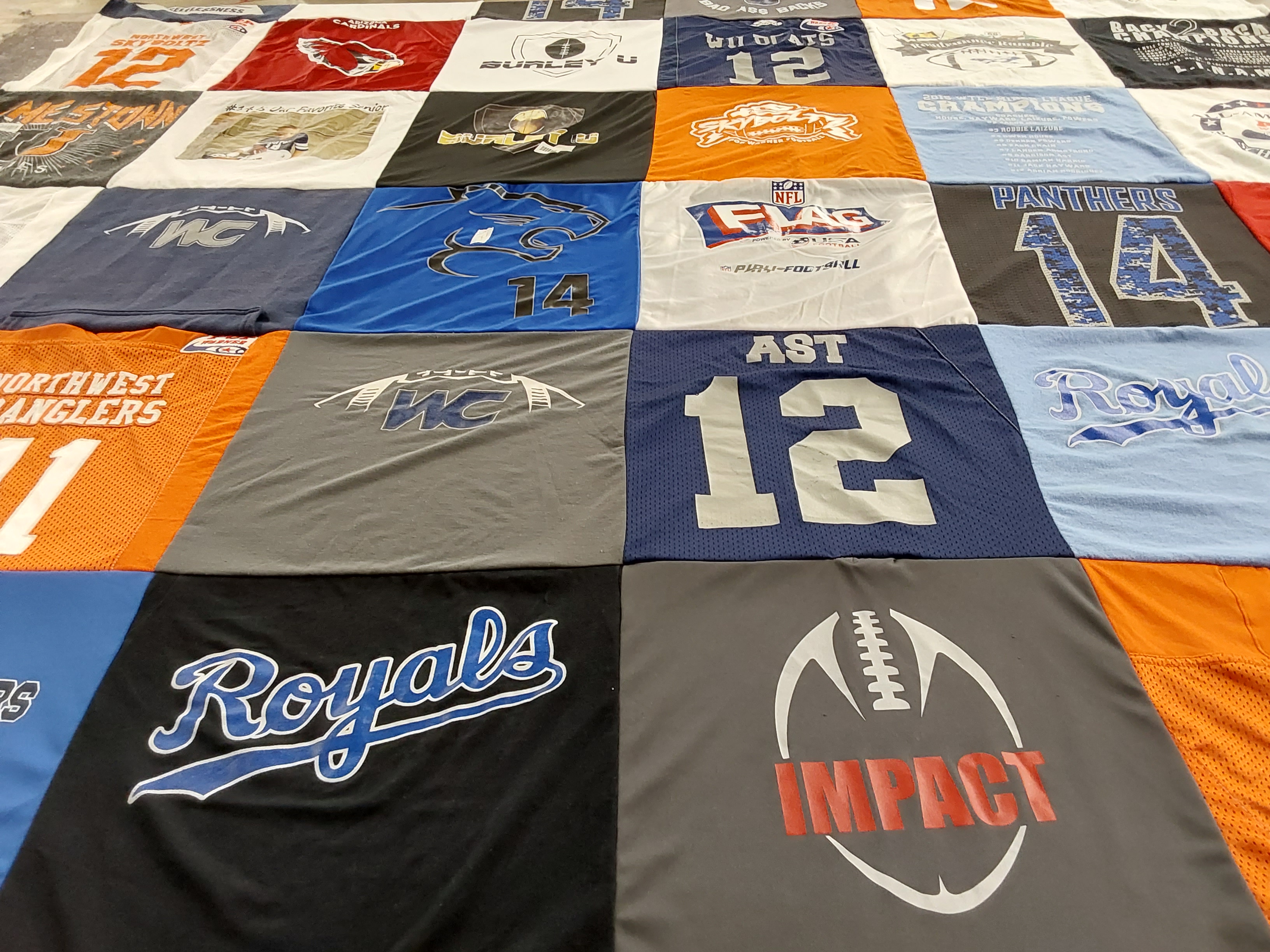 T-shirt quilt with sports, football themes by Erin from AZ