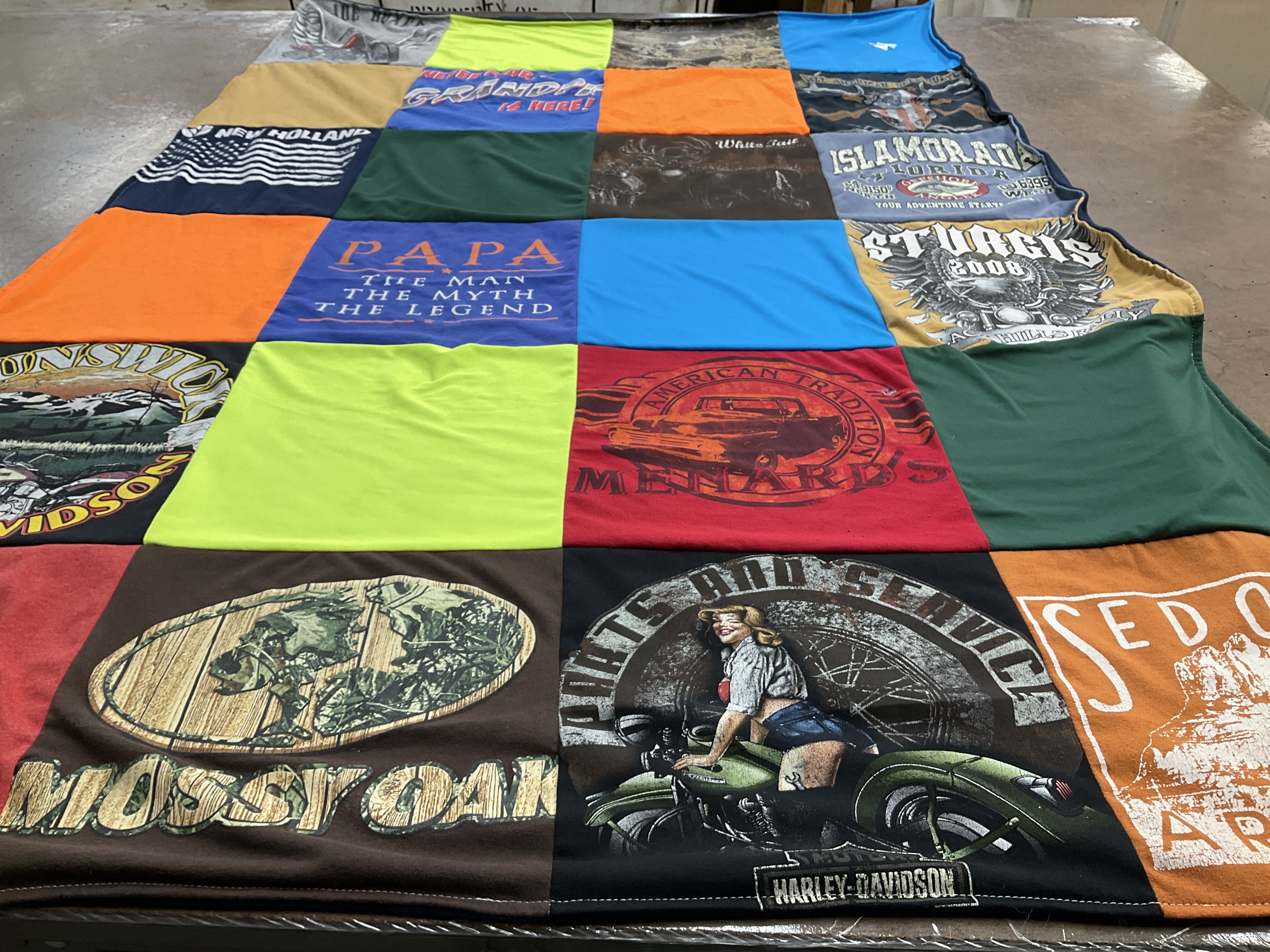 T-shirt quilt with motorcycles, fishing themes by Linda from SD