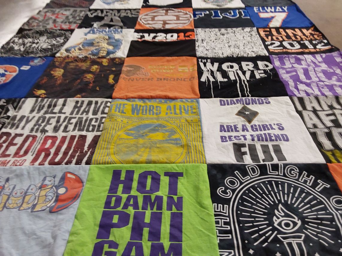 T-shirt quilt with music, sports themes by Amy from CO