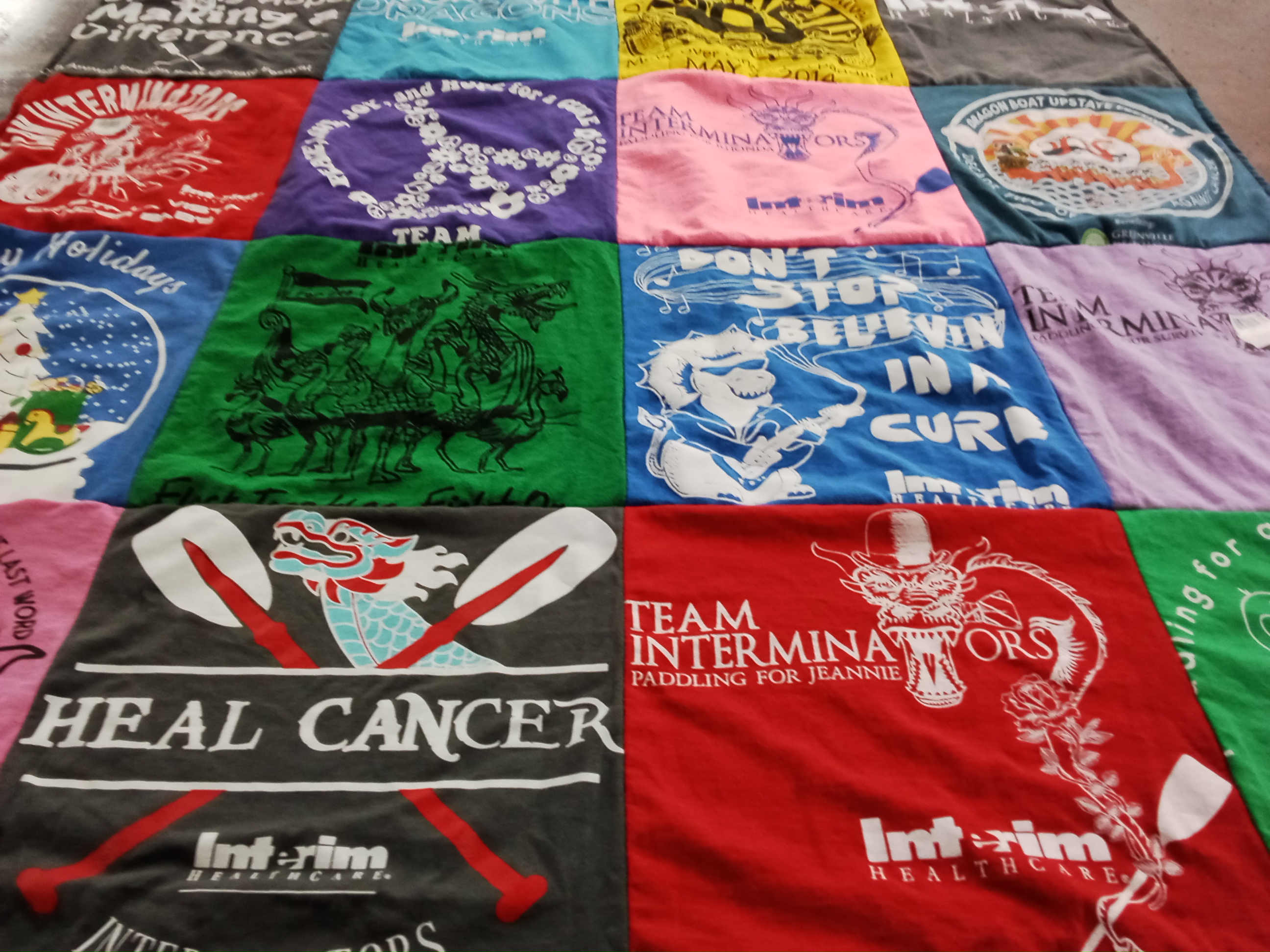 T-shirt quilt with dragon boat racing, health awareness themes by Stephanie from SC