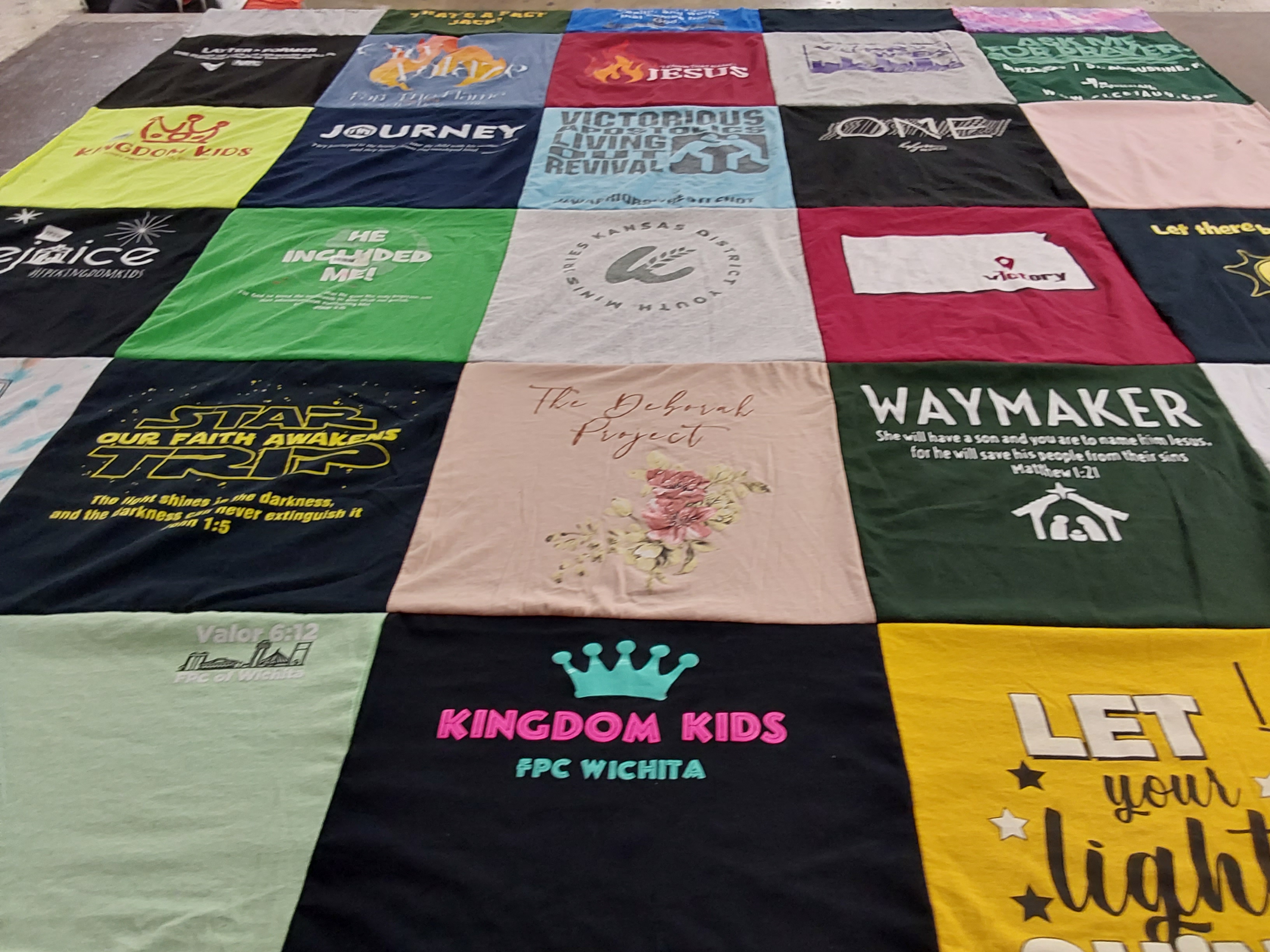 T-shirt quilt with religion, community themes by Rebekah from KS