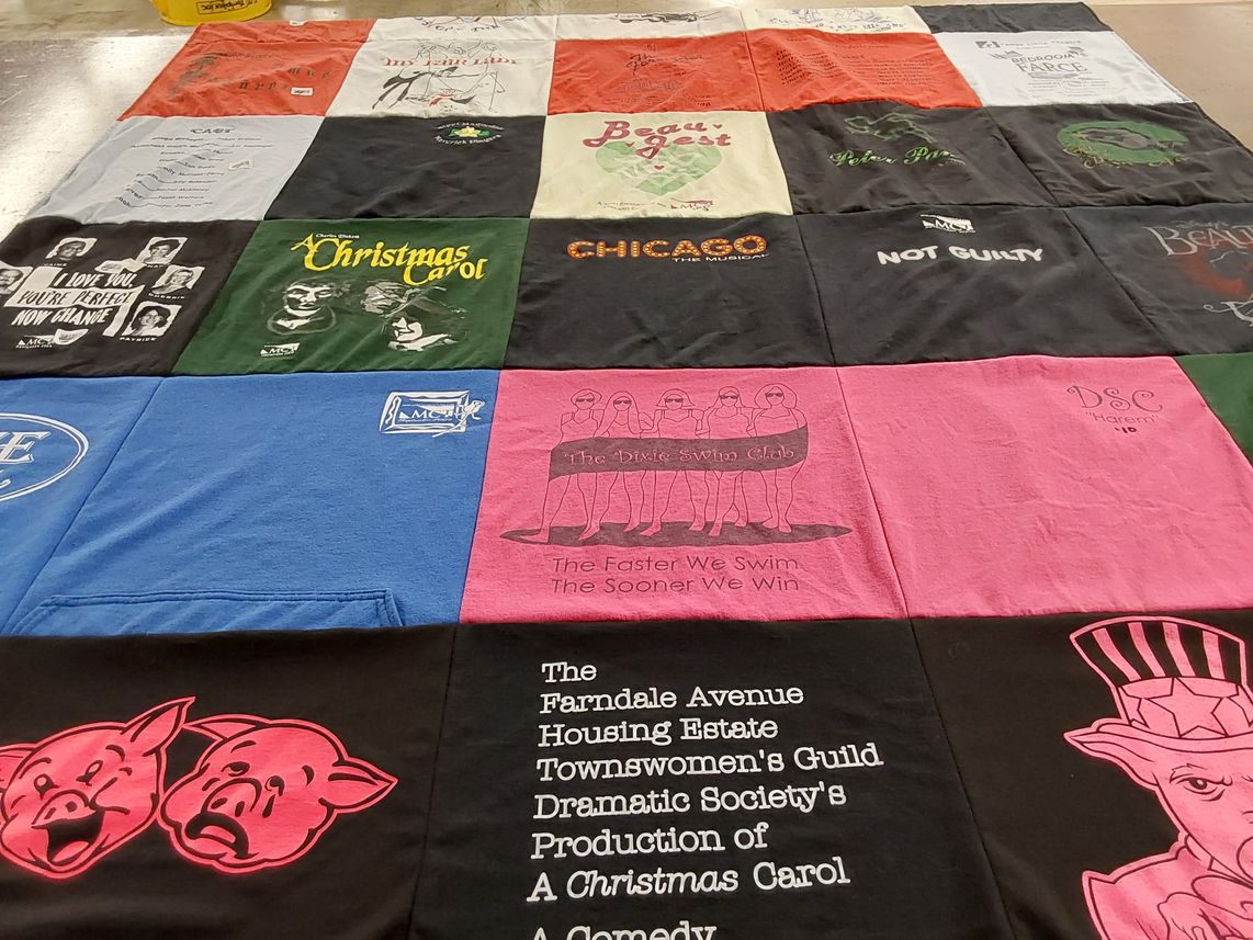 T-shirt quilt with theater, swimming themes by Liz from TX