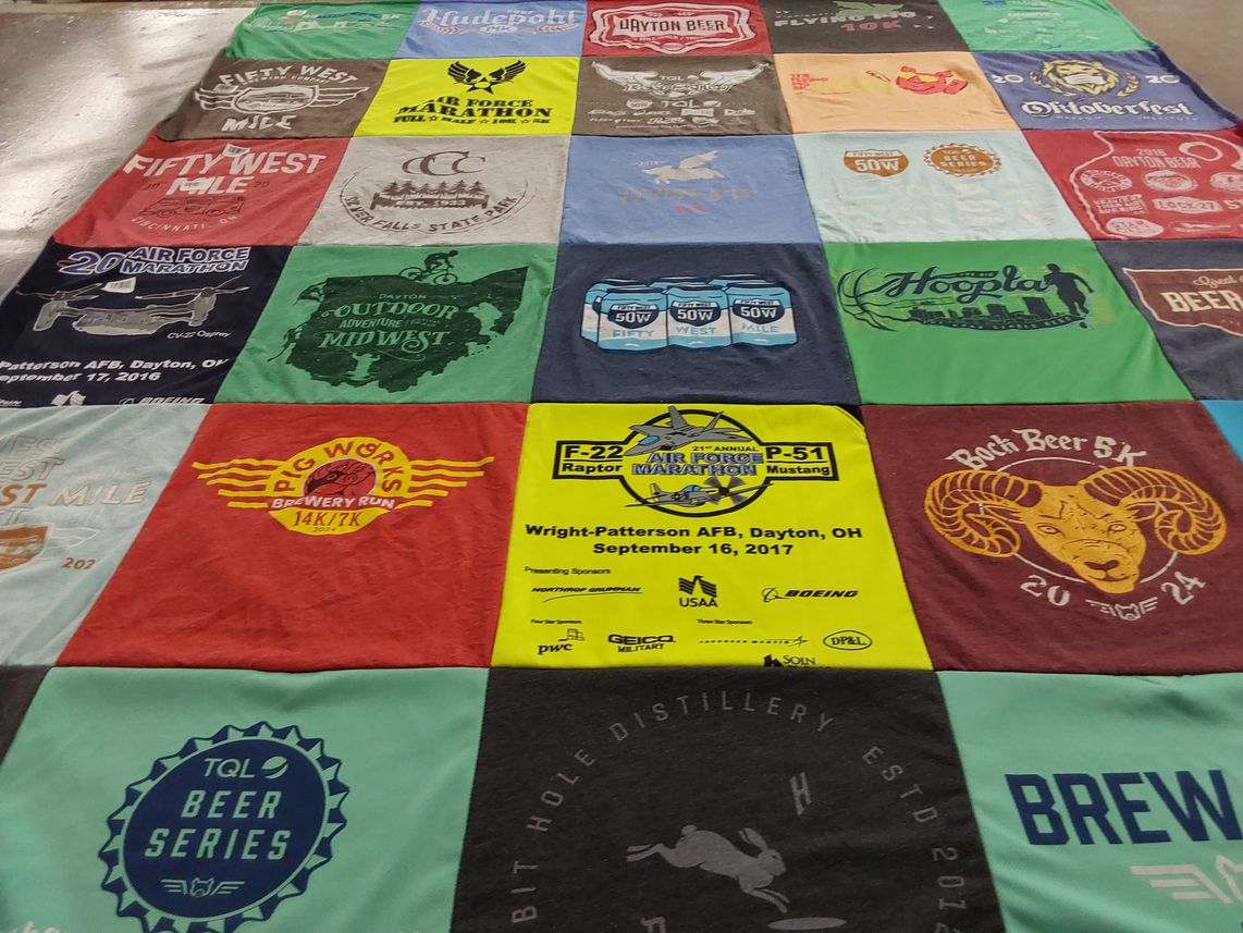 T-shirt quilt with running, breweries themes by Allison from OH