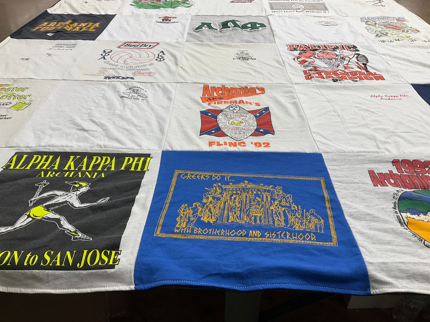 T-shirt quilt with sorority, community themes by Marci from CA