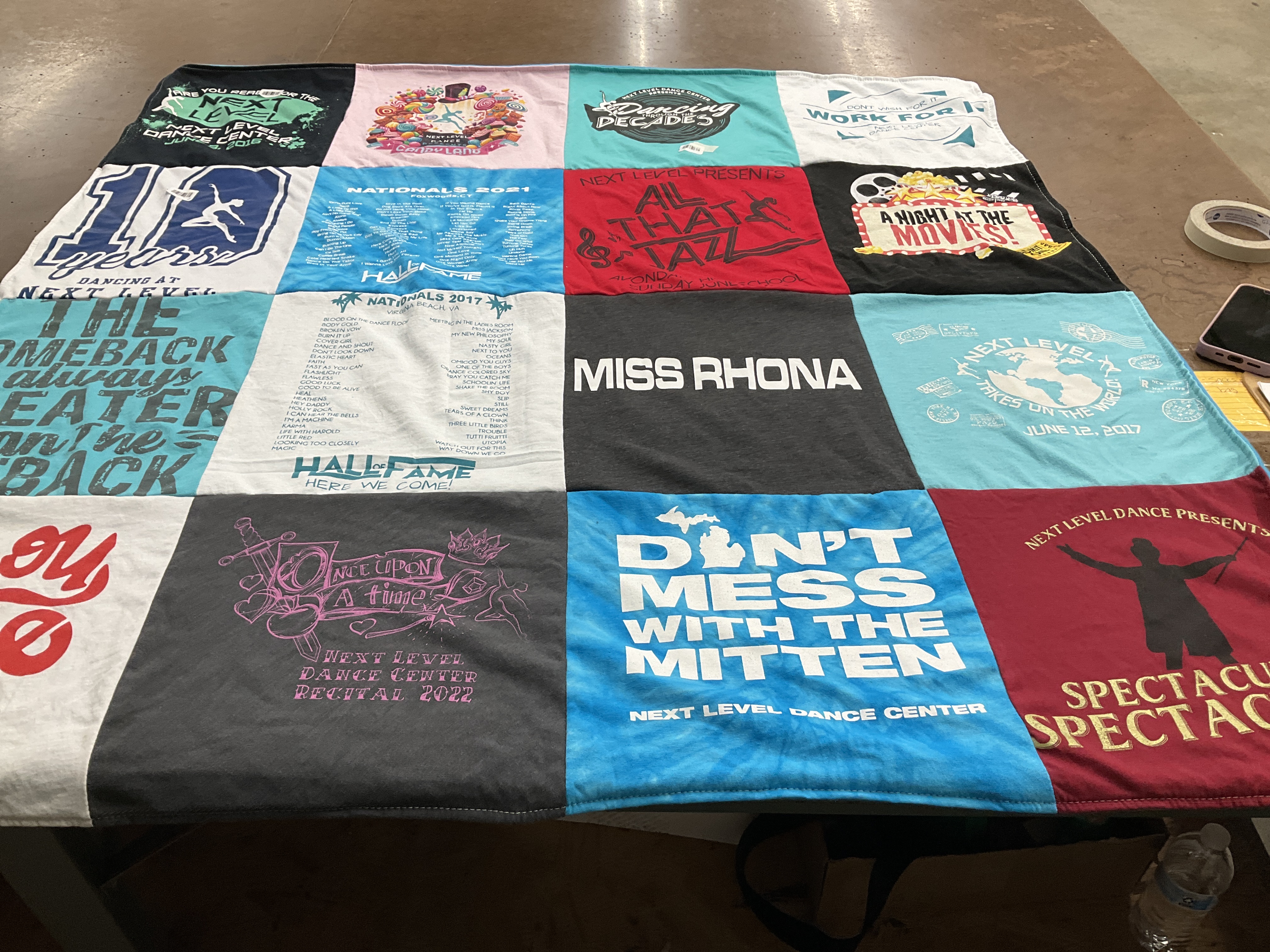 T-shirt quilt with dance, performing arts themes by Rhona from MI