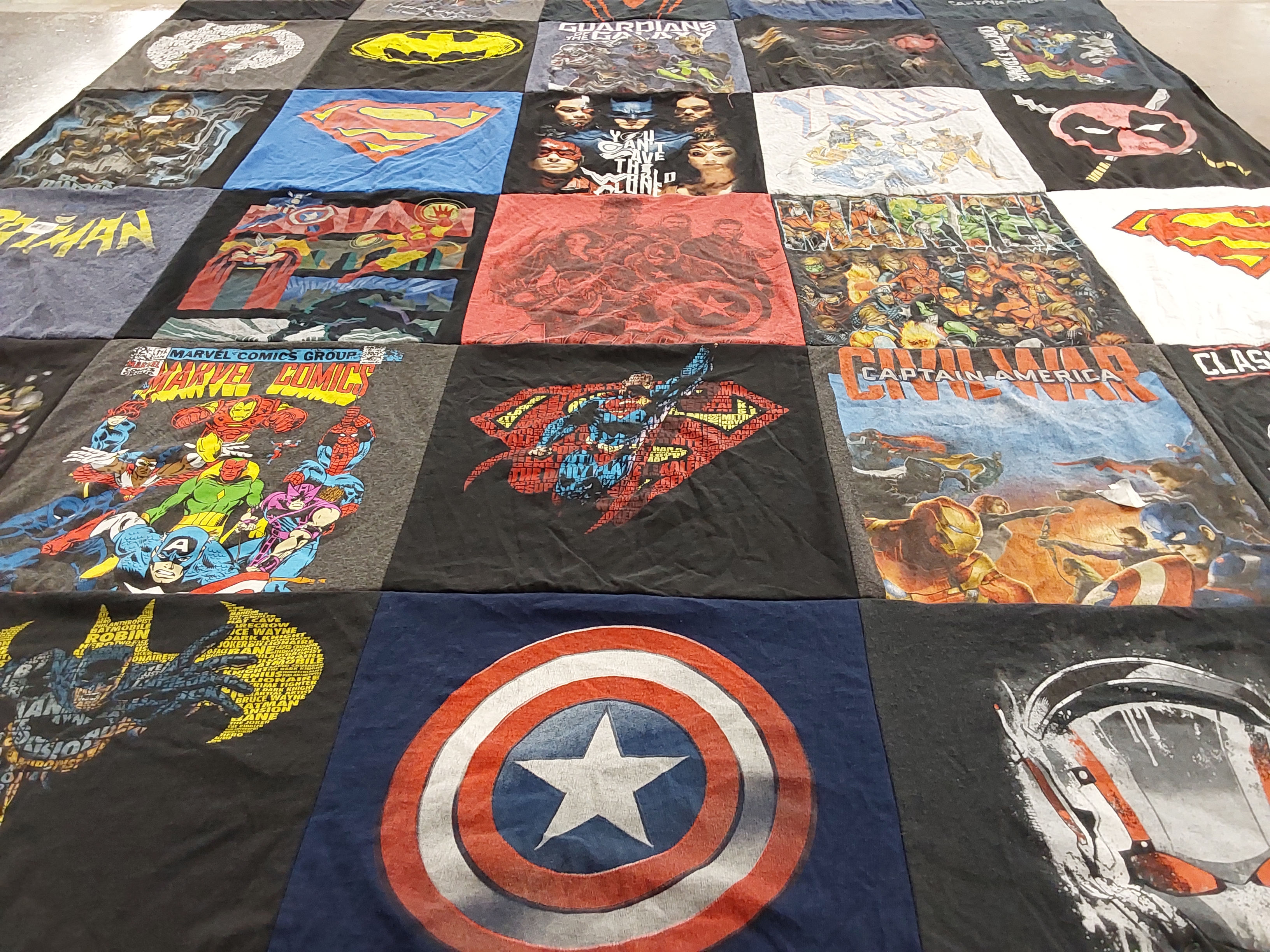T-shirt quilt with comic books, superheroes themes by Mary from IN