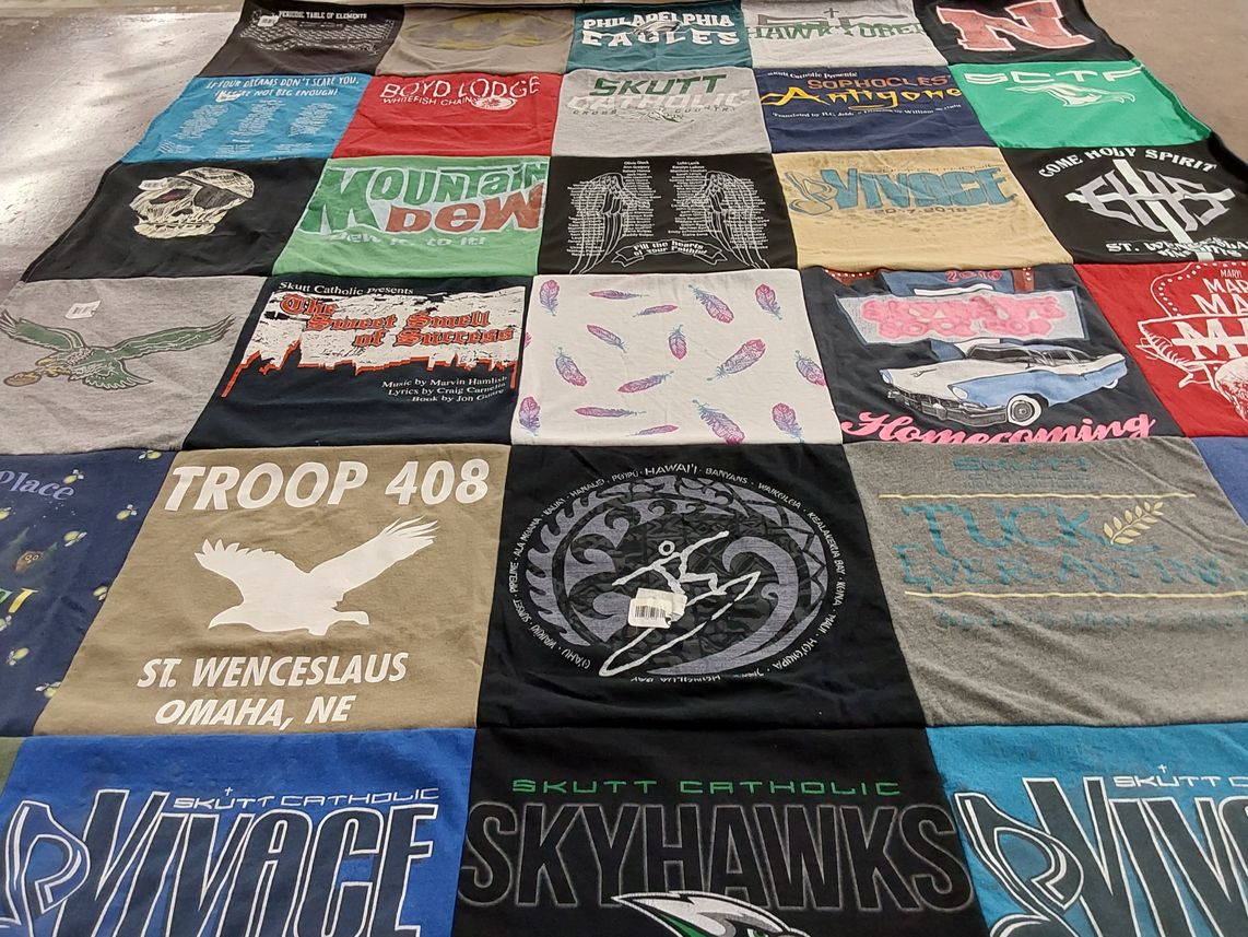 T-shirt quilt featuring skutt catholic skyhawks by Megan from NE