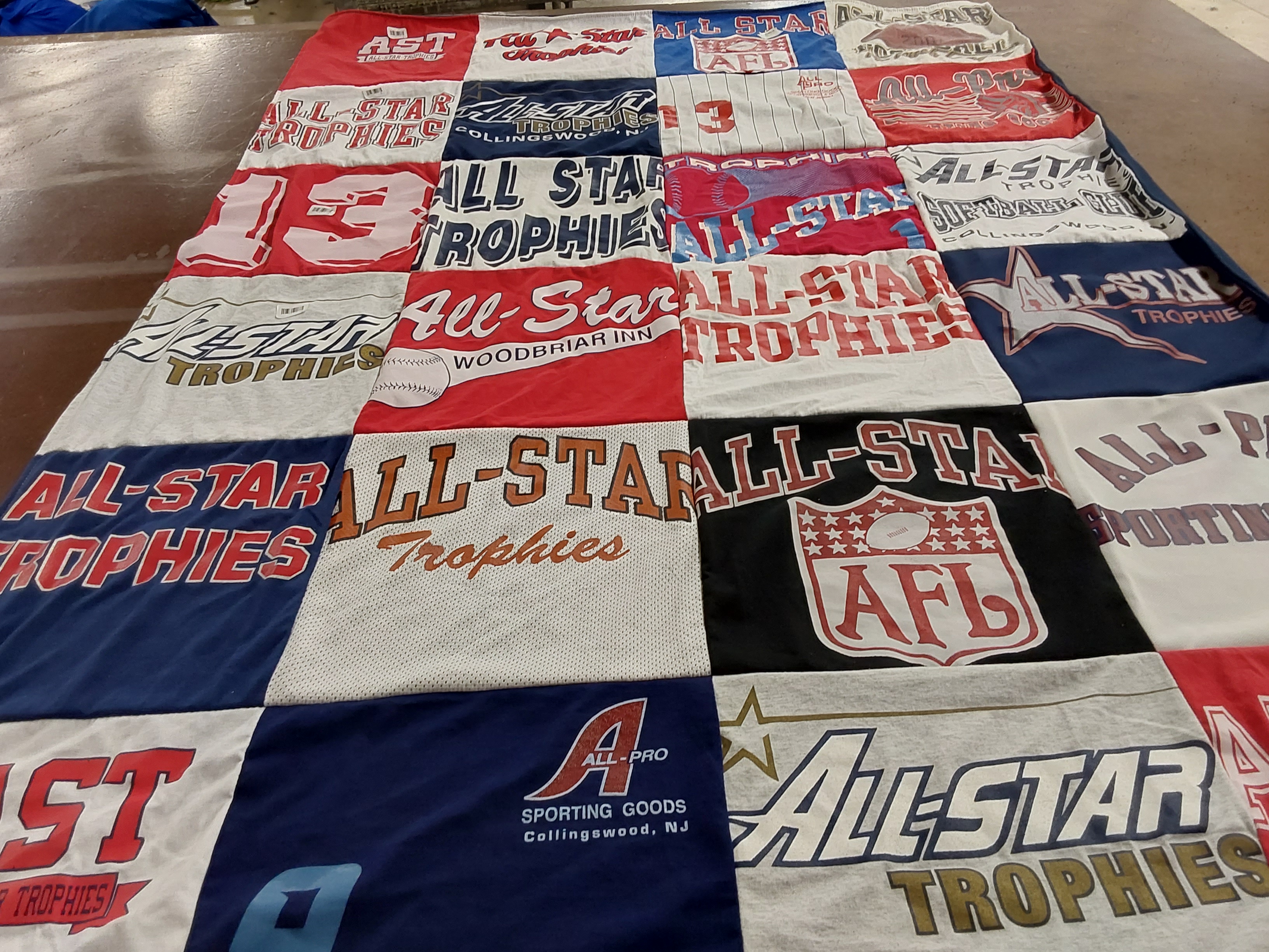 T-shirt quilt with sports, trophies themes by Andrew from NJ
