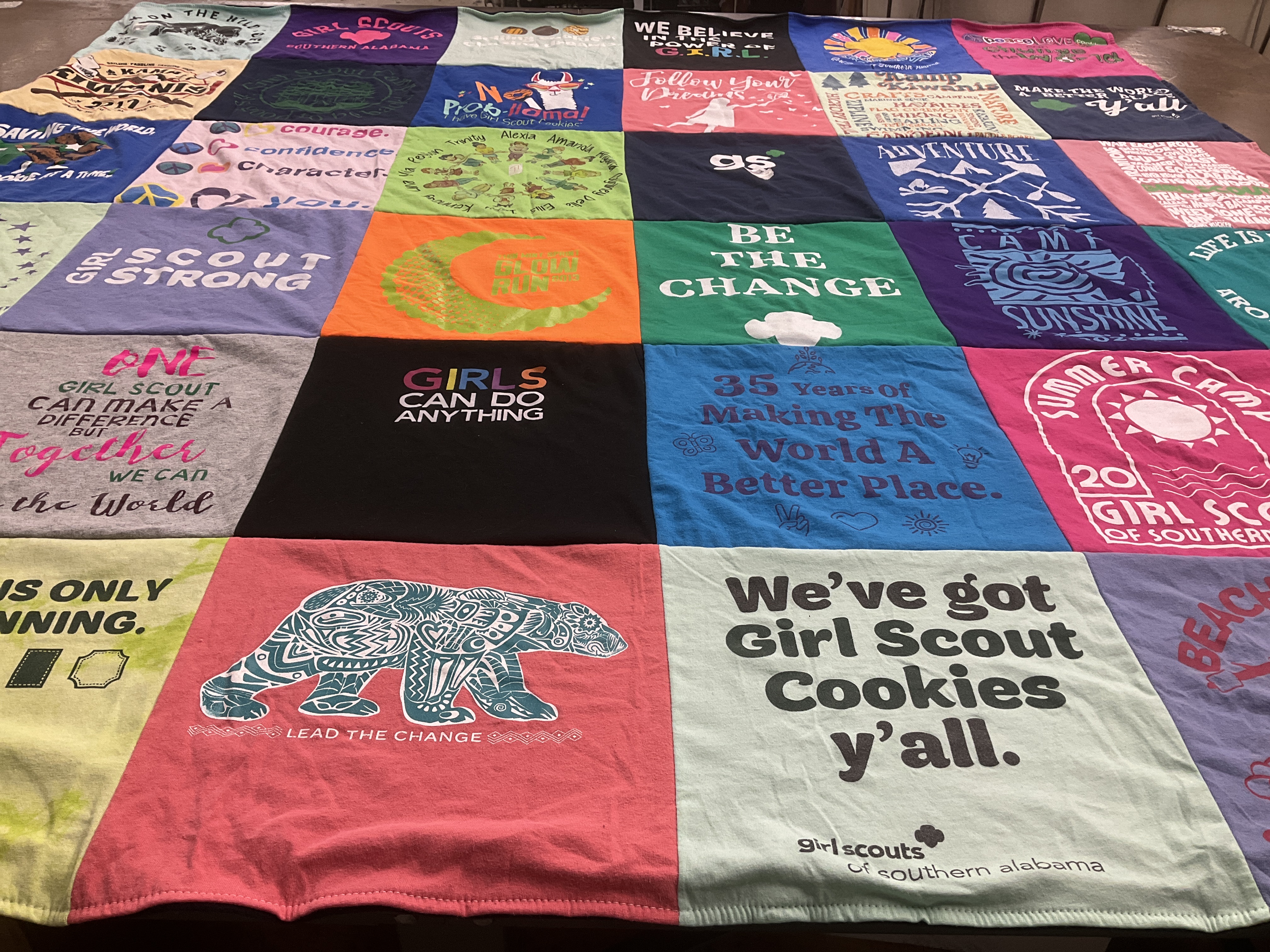 T-shirt quilt with girl scouts, community service themes by Karlyn from AL