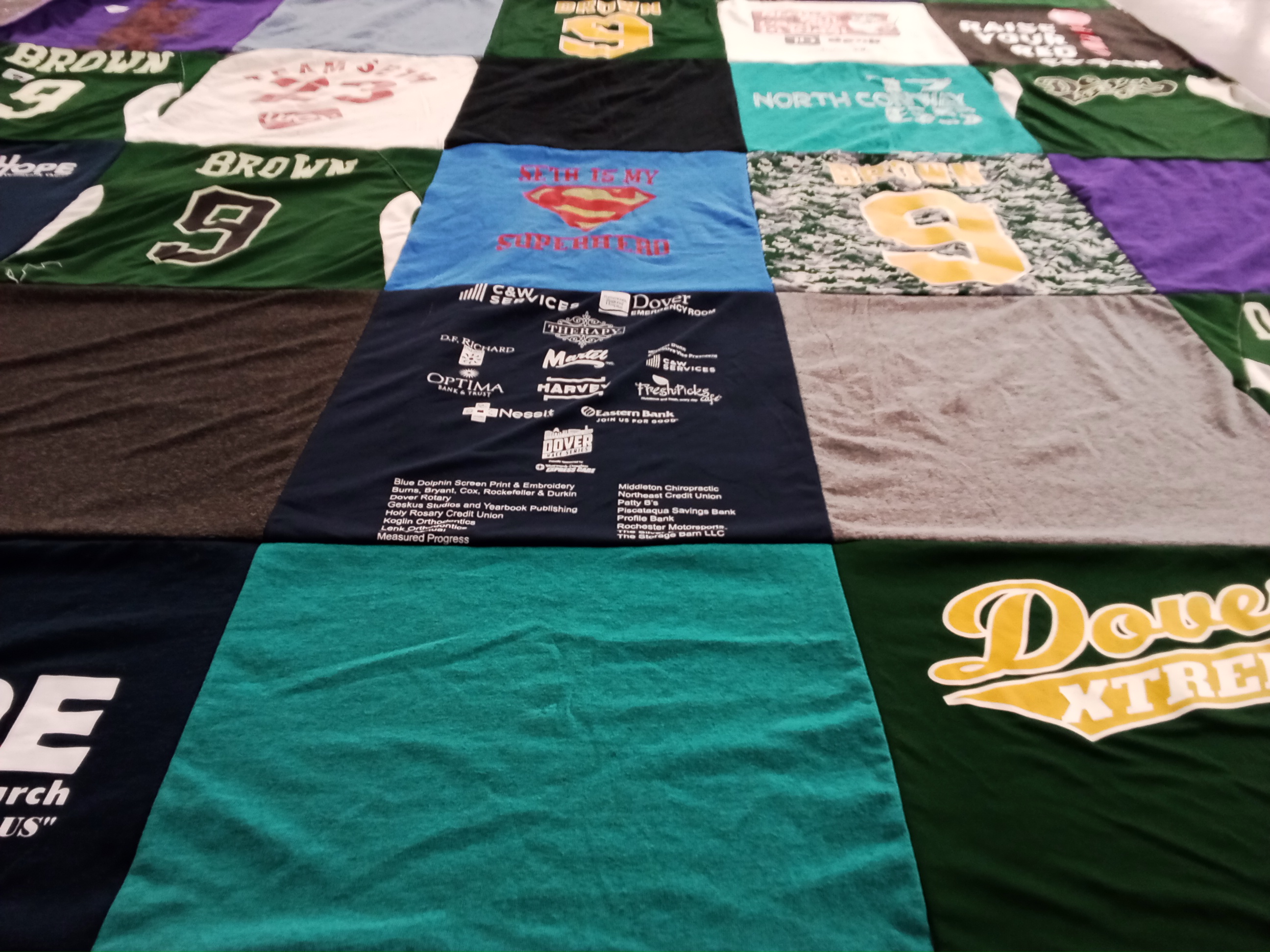 T-shirt quilt with sports, family themes by Emilie from NH