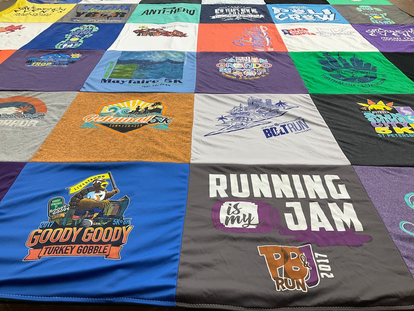 T-shirt quilt with running, fitness themes by Kelly from FL