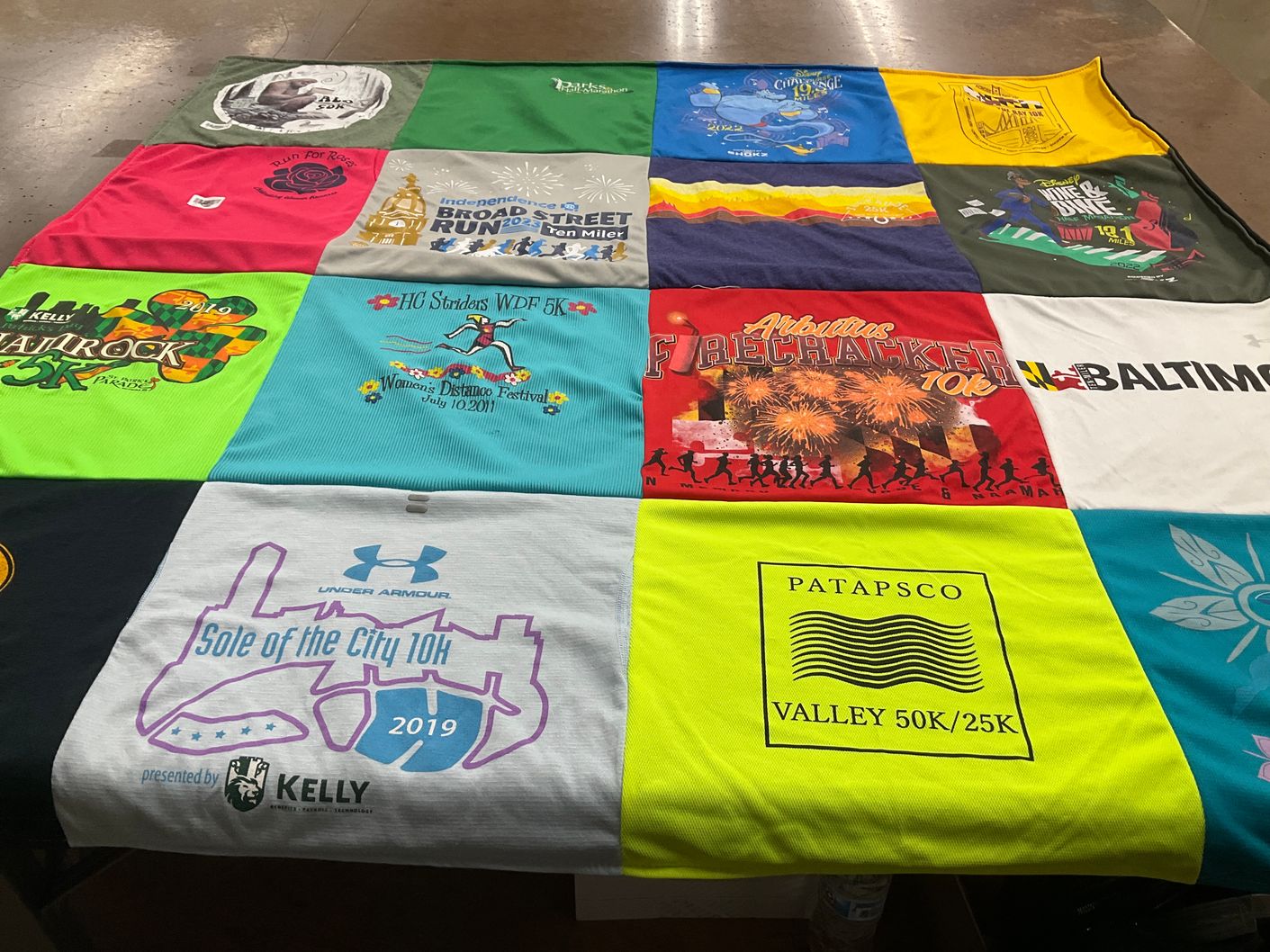 T-shirt quilt with running, fitness themes by Carolyn from MD