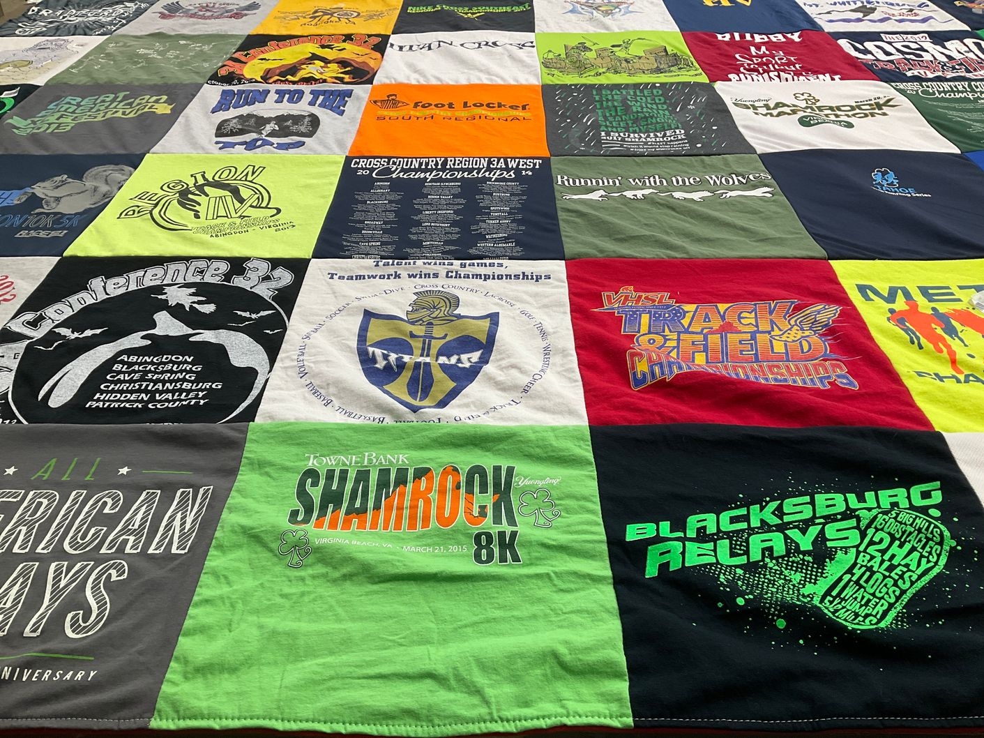 T-shirt quilt featuring blacksburg high school track and field, christiansburg high school track and field by Hannah from VA