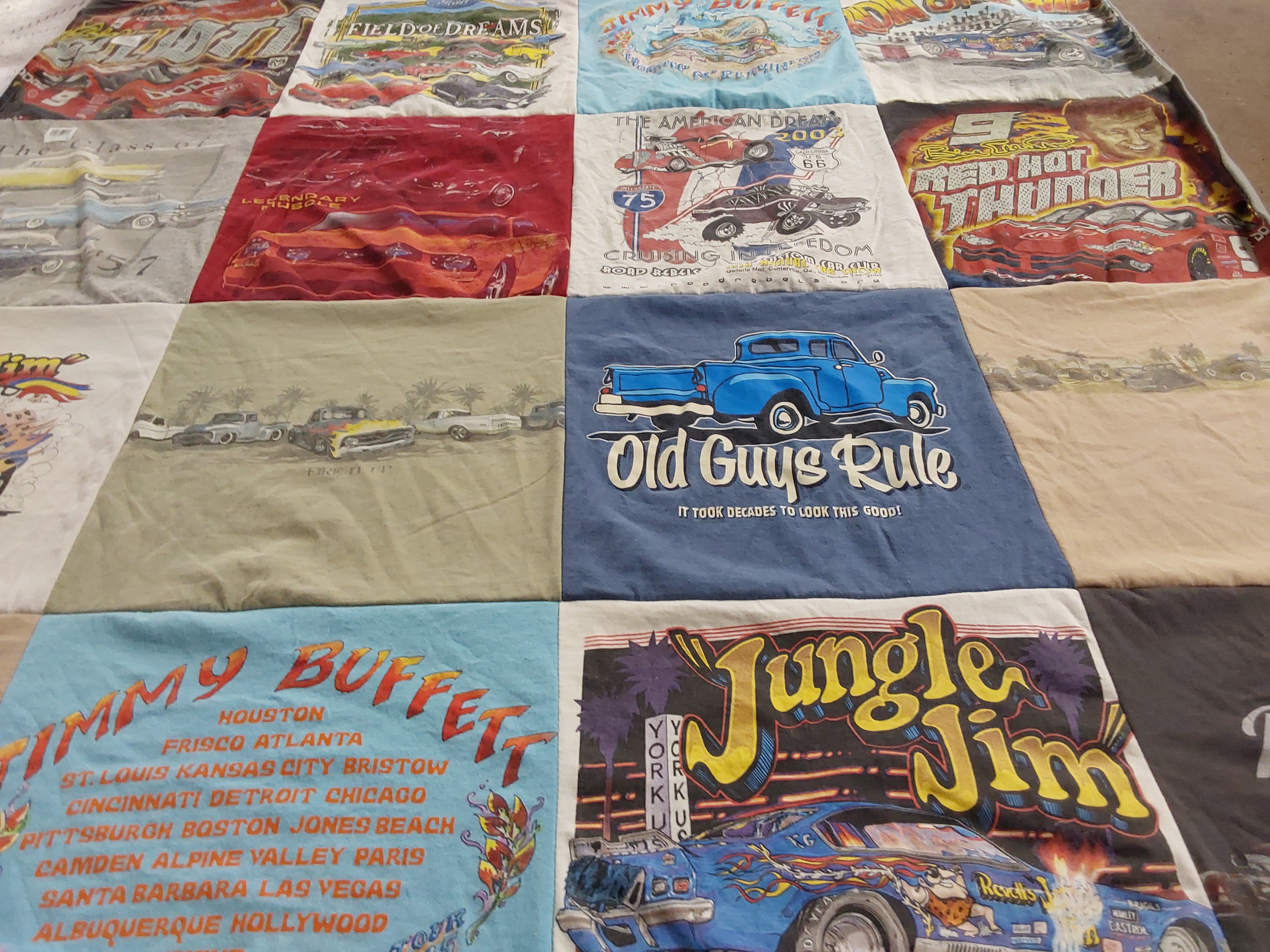 T-shirt quilt with cars, music themes by Linda from TN